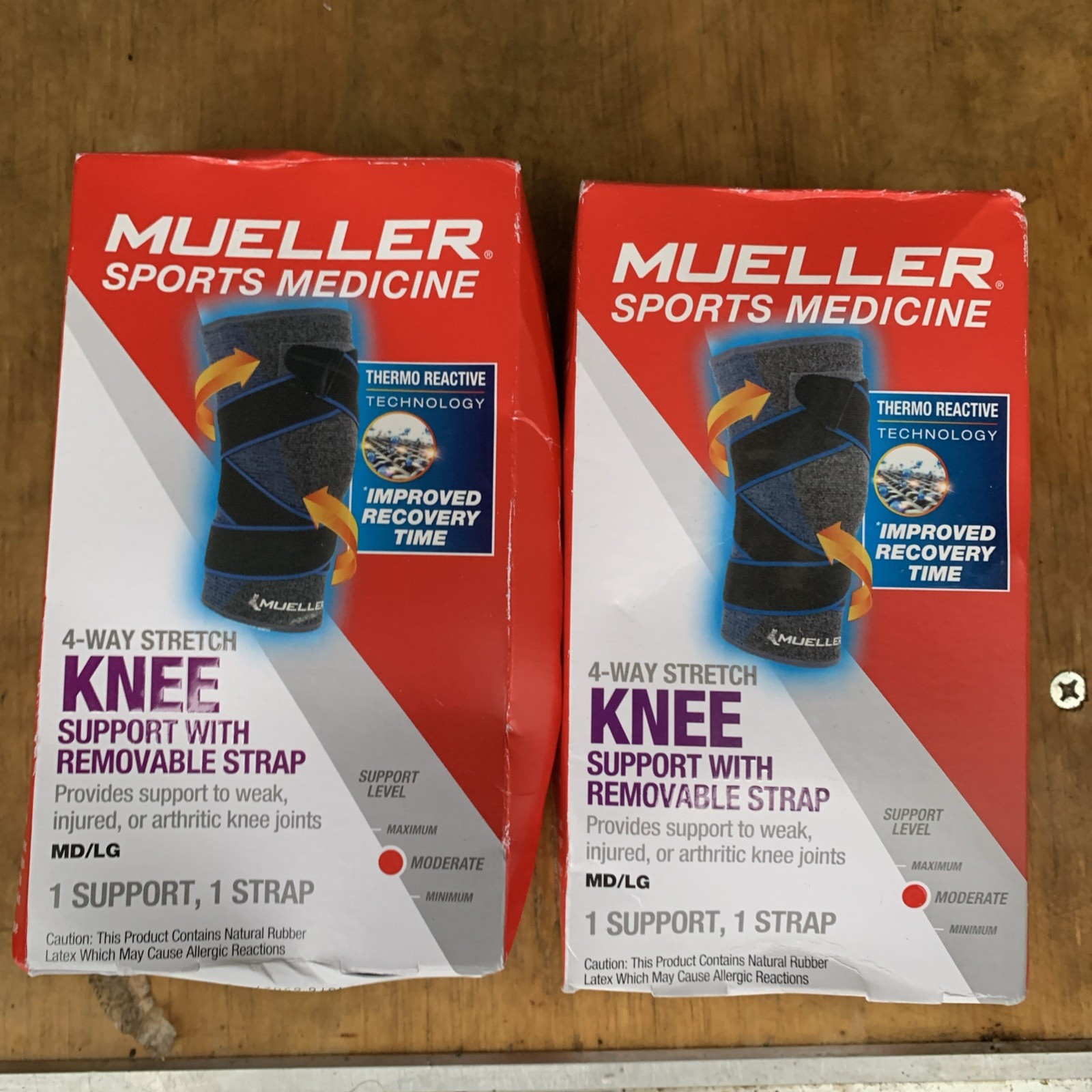 2 Pack: Mueller 4 Way Stretch Knee Moderate Support w/ Straps MD/LG