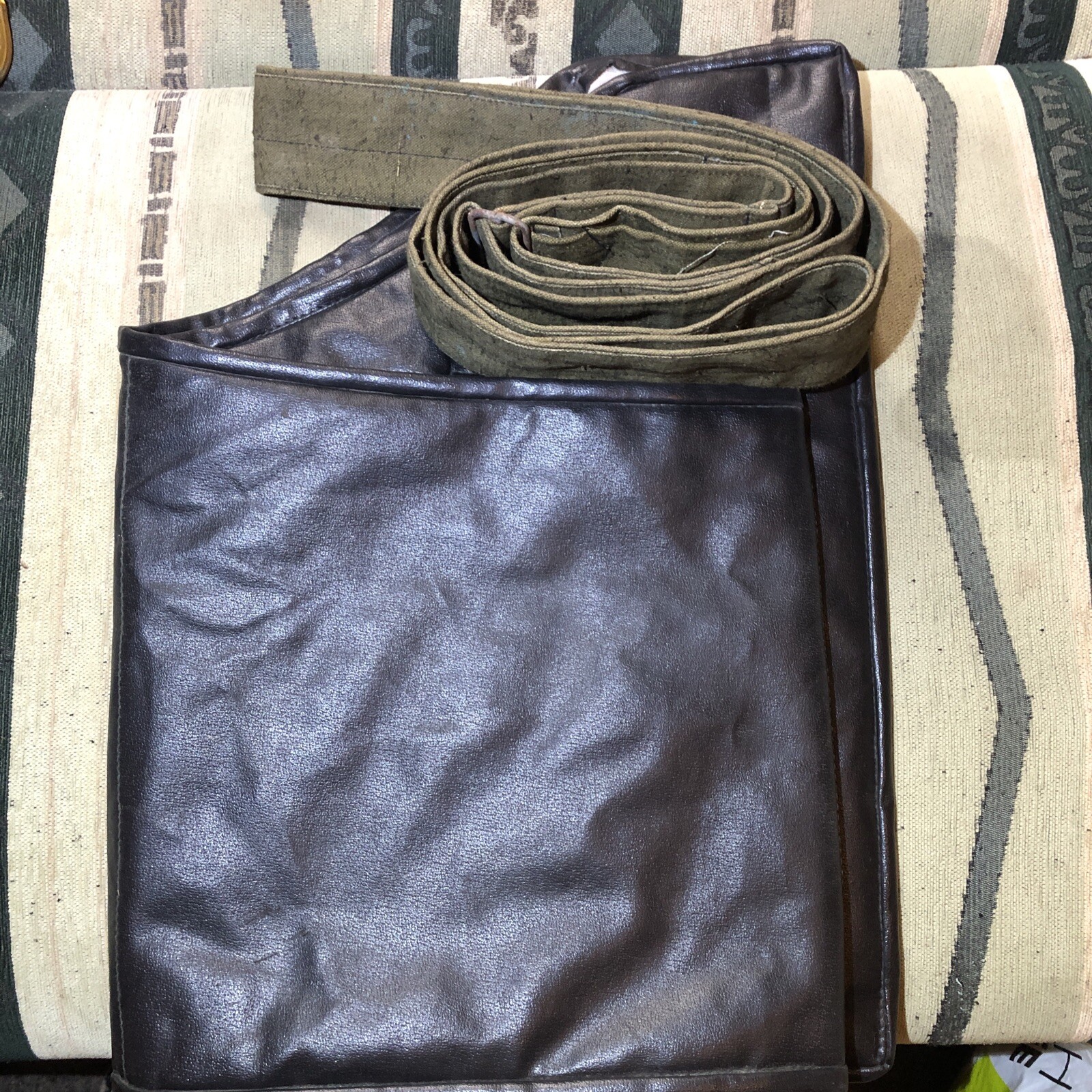For the lower back, bind those in need. Warm leather blanket with a belt.