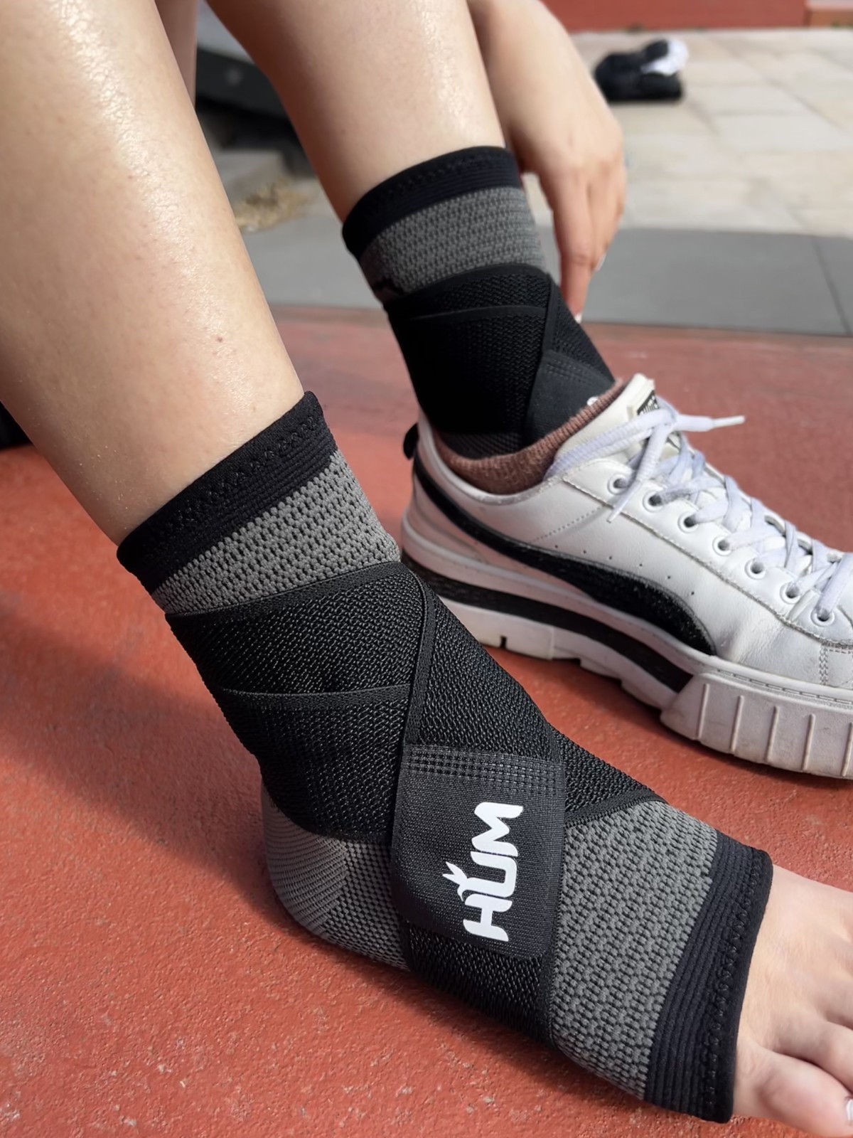 Ankle support brace foot sleeve with compression strap for all sports