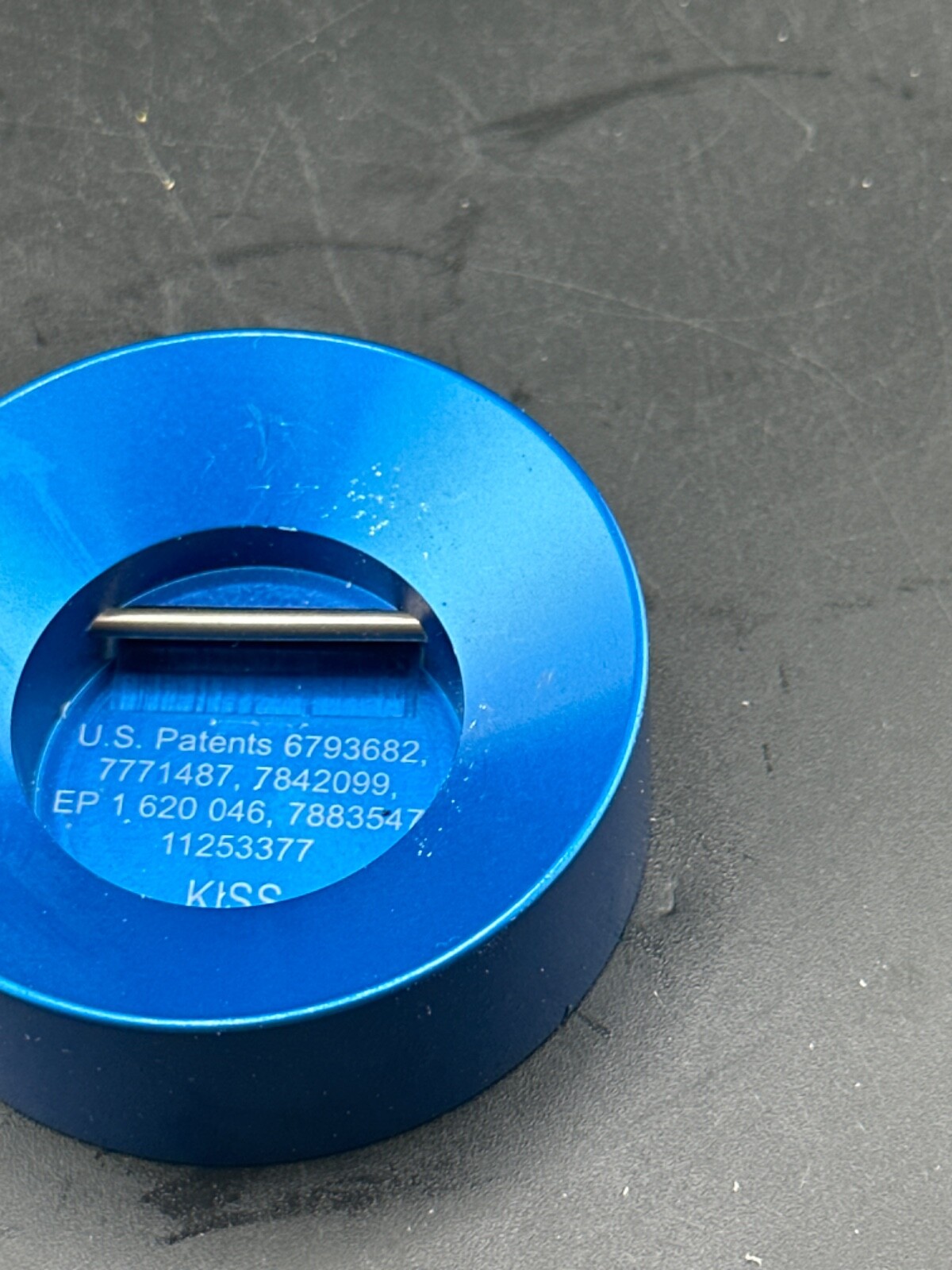 Prosthetic leg component adapter part. Kiss lanyard Layard plate