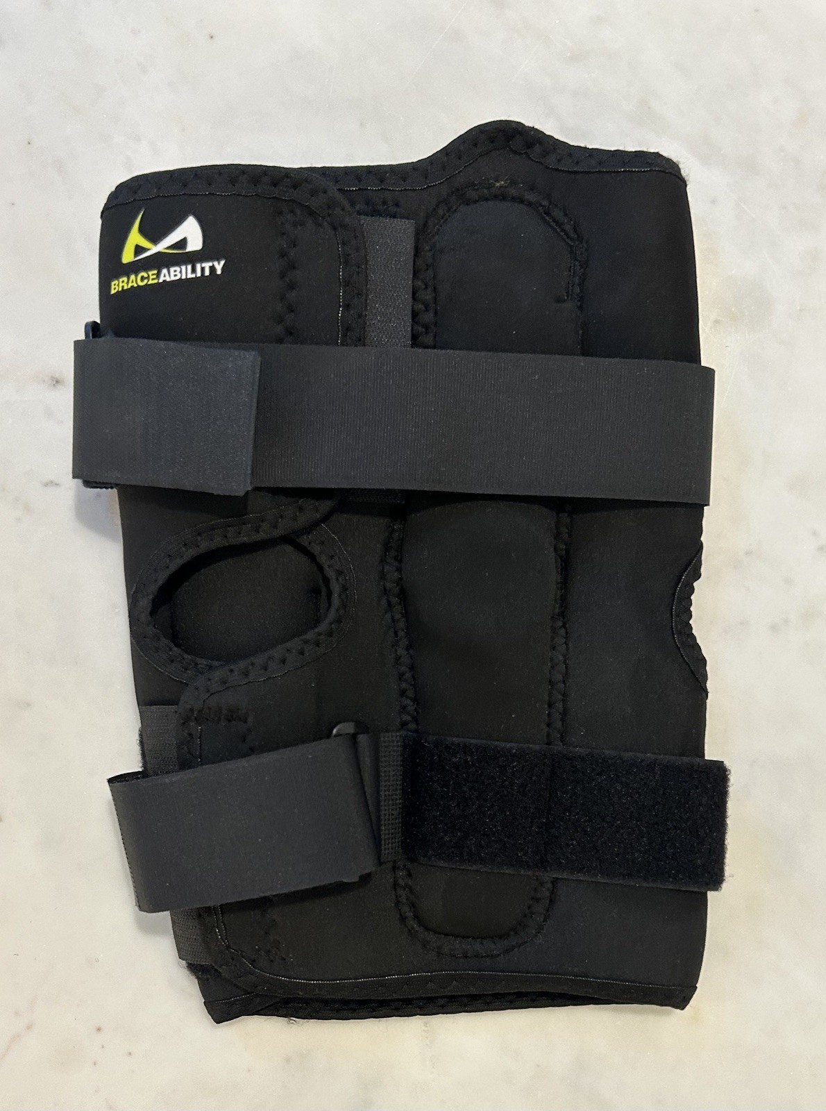 BraceAbility XXL Hinged Knee Brace adjustable wraparound design side hinge
