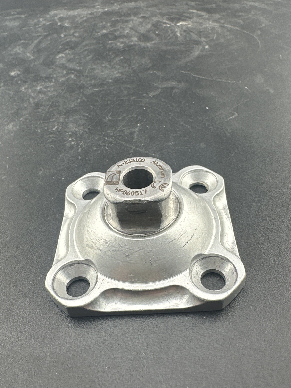 Ossur Prosthetic Four Hole plate Adapter Component.