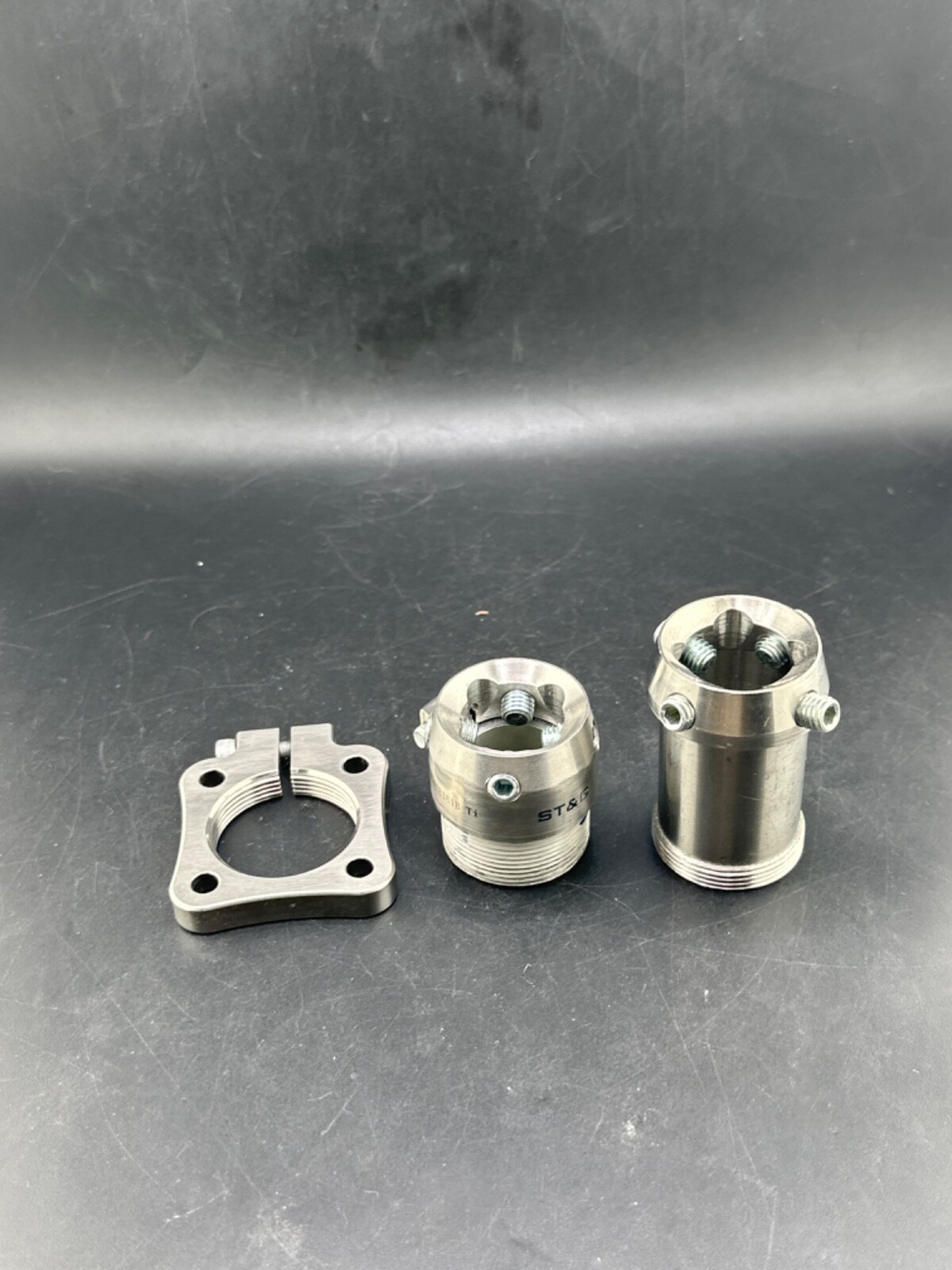 Prosthetic component adapter part. Female receiver w/rotator. 3 parts