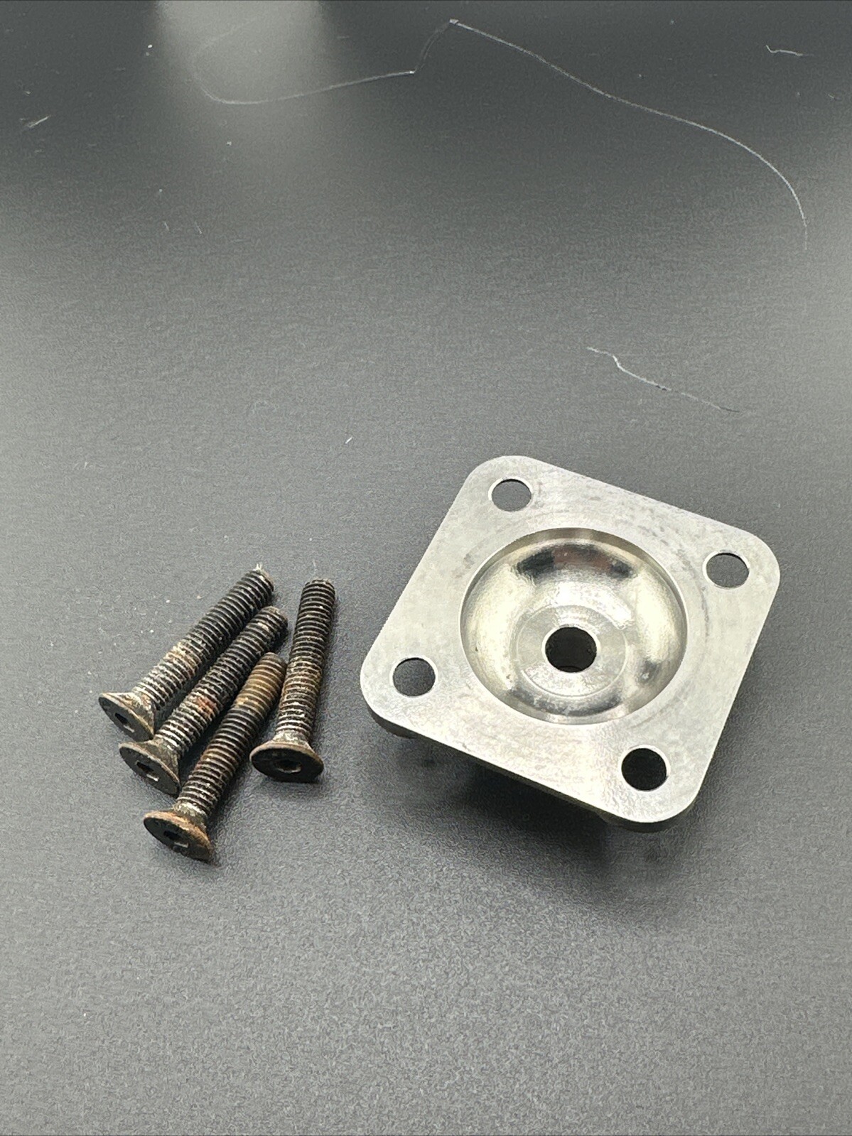 Medex 4 Hole Prosthetic Plate. Titanium.