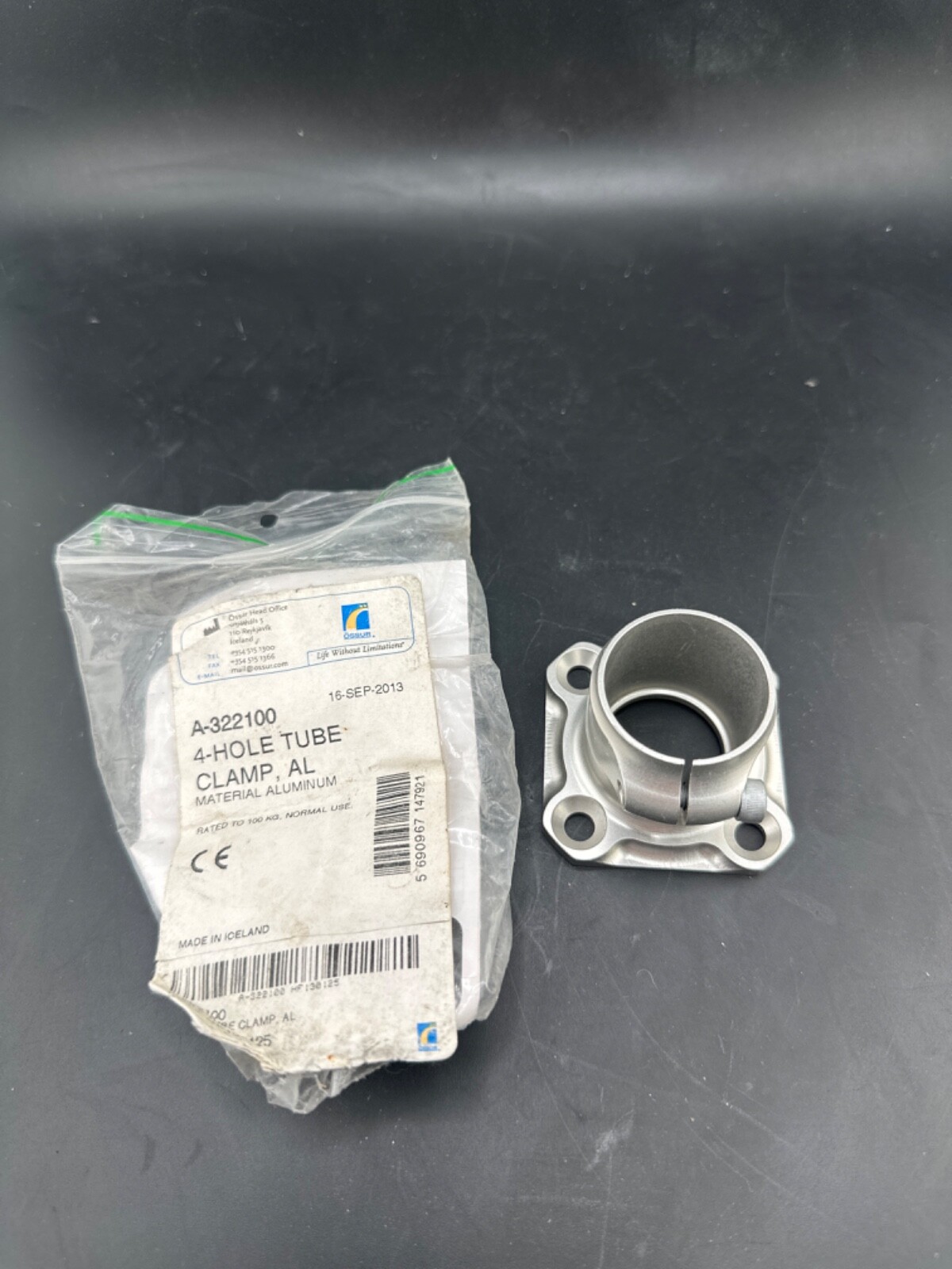 Ossur 4 hole tube clamp. Prosthetic adapter. A-322100. New