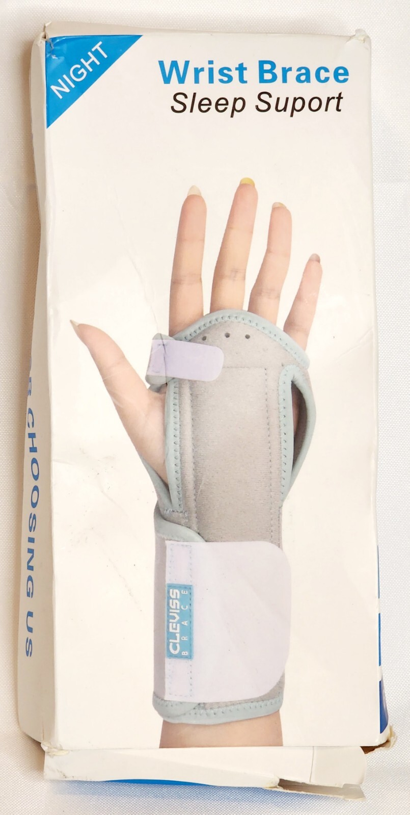 Clevvis Brace. Wrist support. NEVER USED Pink. Right or left wrist.damaged box