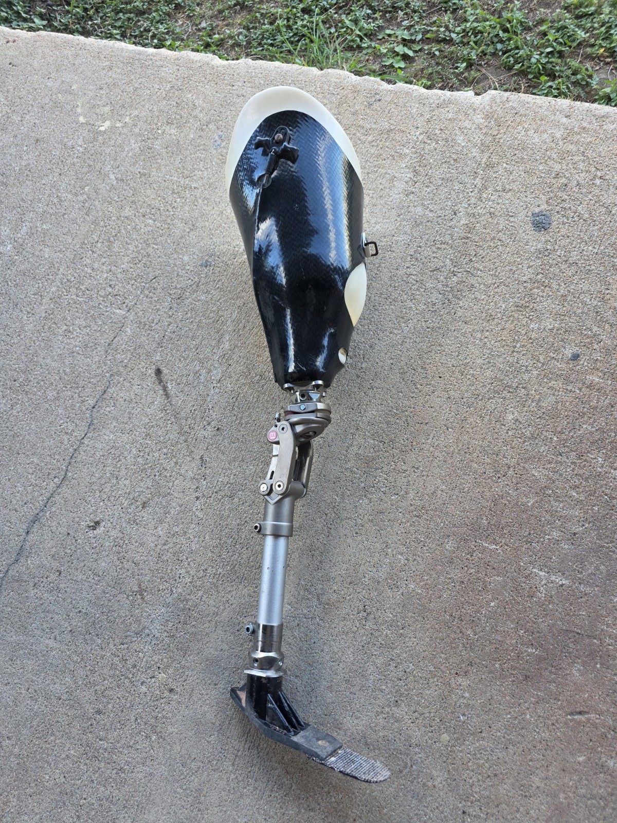 Prosthetic leg- Titanium shaft with real carbon fiber.
