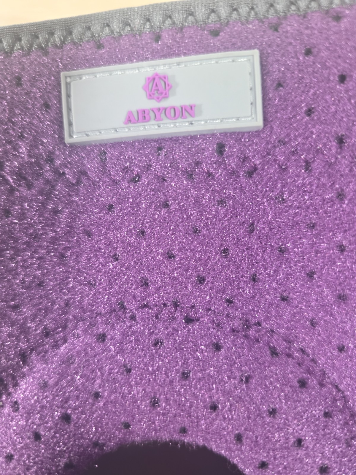abyon 4x/5x knee support brace purple in color, open, New Without Box