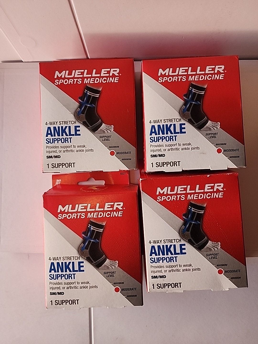 Mueller 4-Way Stretch Ankle Support SM/MD – Moderate Support Brace for Weak/Inju