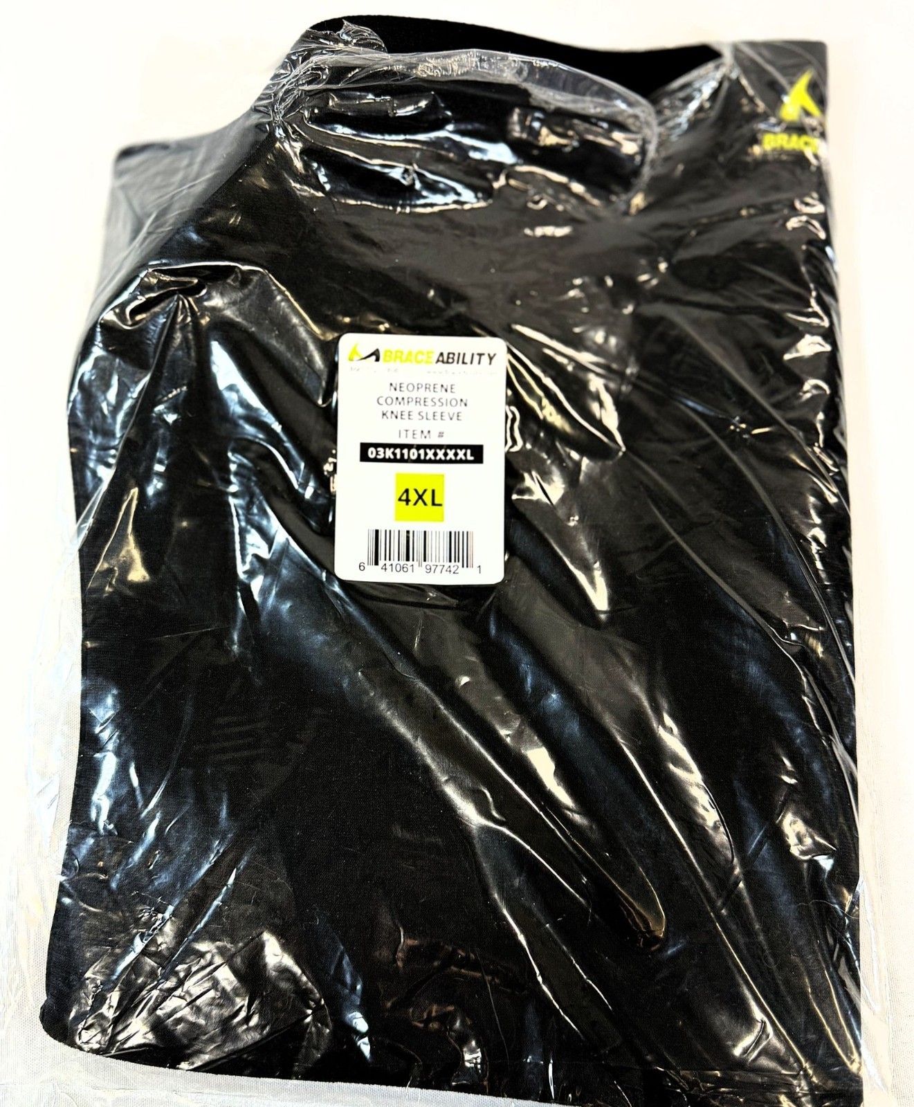 BraceAbility Neoprene Compression Knee Sleeve 4XL Black Support Sleeve