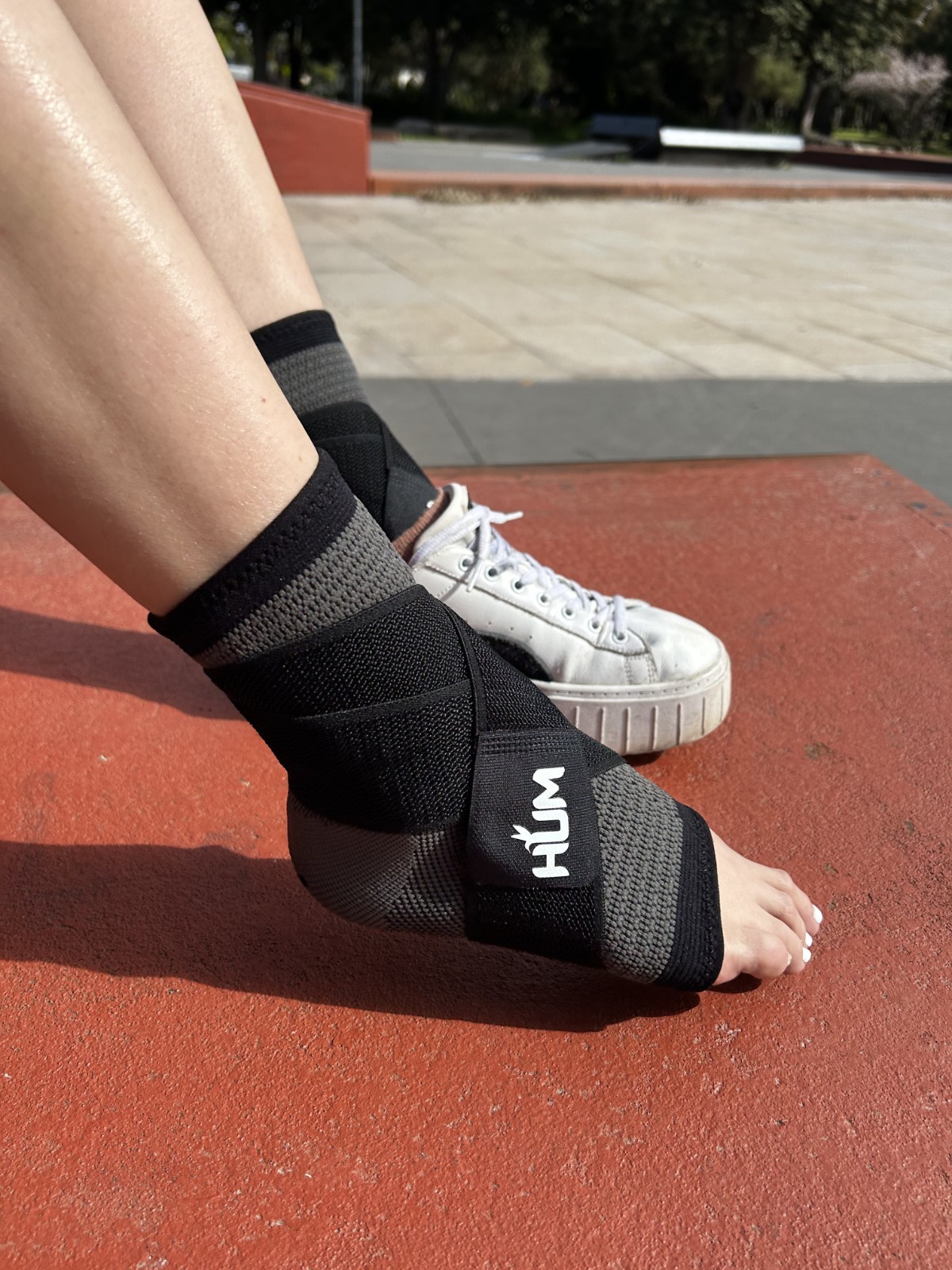 Ankle support brace foot sleeve with compression strap for all sports