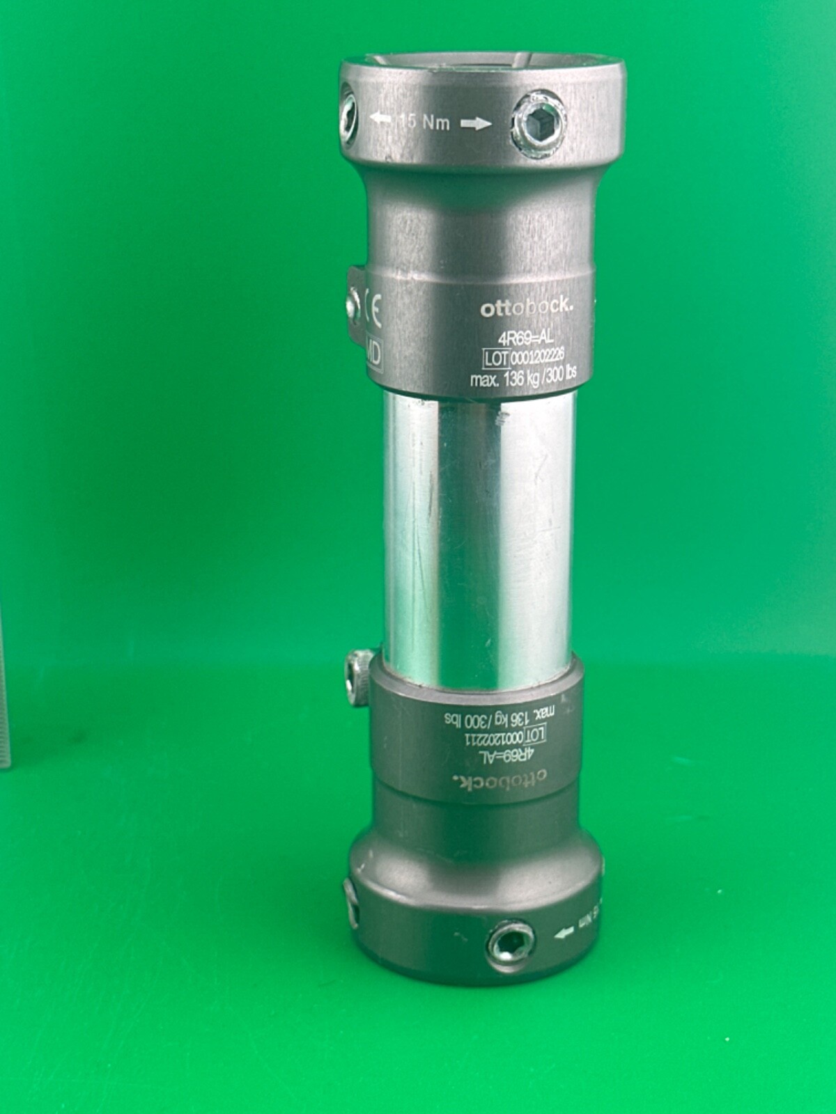 Prosthetic component adapter part. Otto Bock 4R69=AL prosthetic tube clamps.