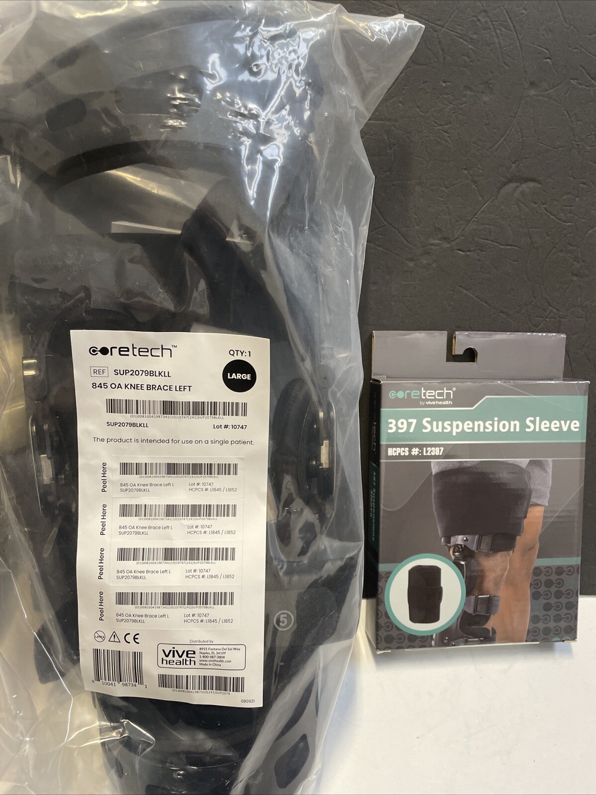 Coretech 845 OA Knee Brace Left Med. BRAND NEW w/ Suspension Sleeve