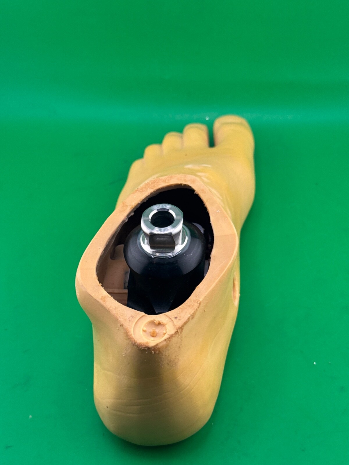 Uniprox single axis prosthetic foot. Left. Size 26