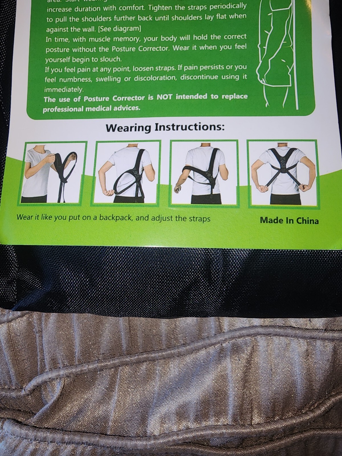 NWT Posture Corrector, black in color