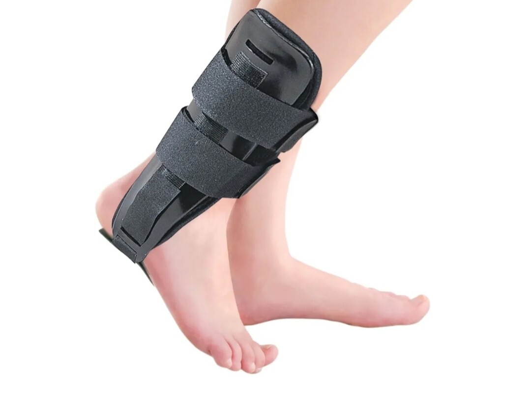 New! Ankle Brace Universal Stirrup hard shell foam cushion style Size Medium