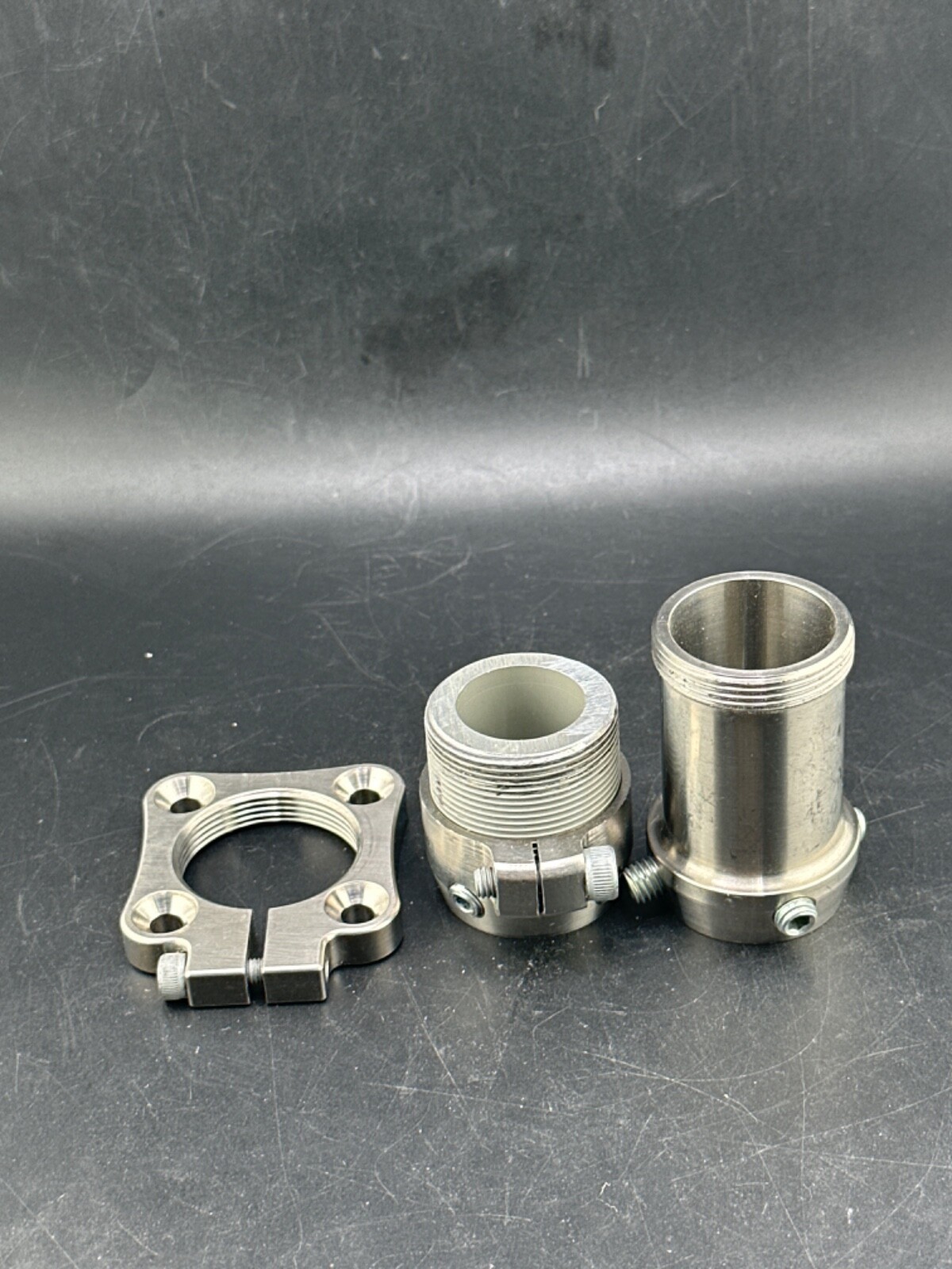 Prosthetic component adapter part. Female receiver w/rotator. 3 parts