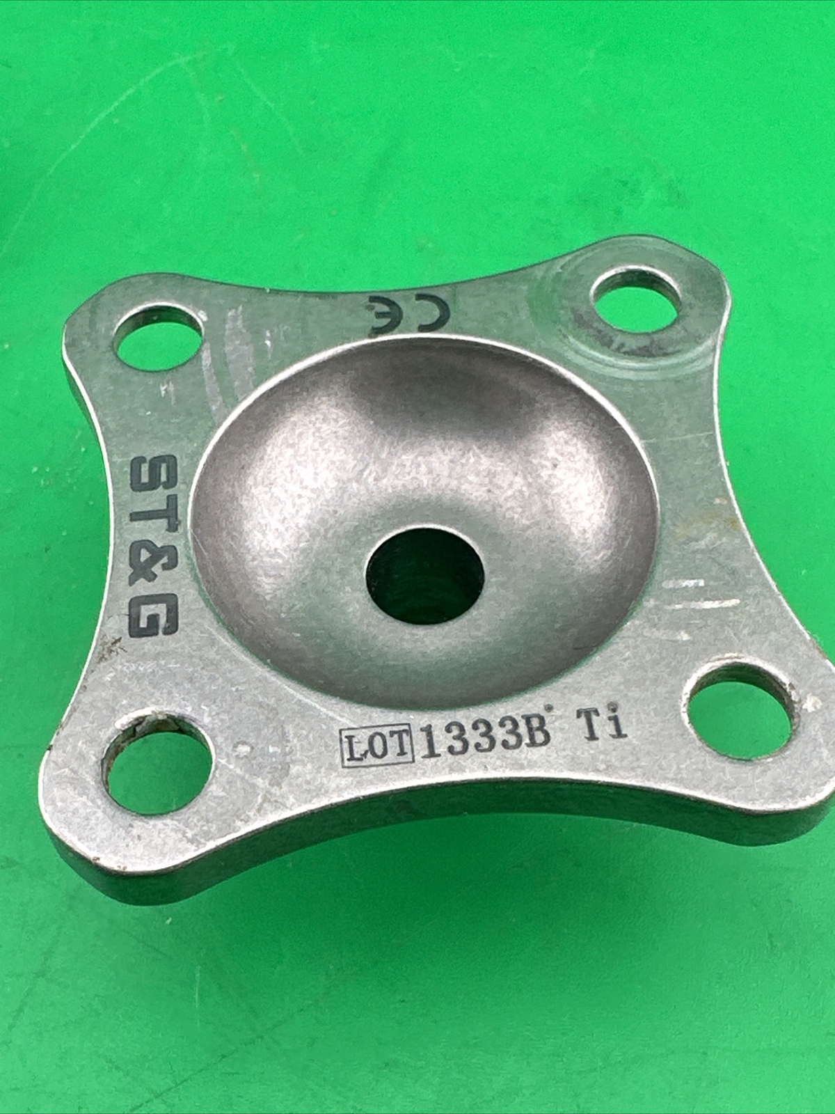Prosthetic 4 Hole Plate Adapter Component. Titanium