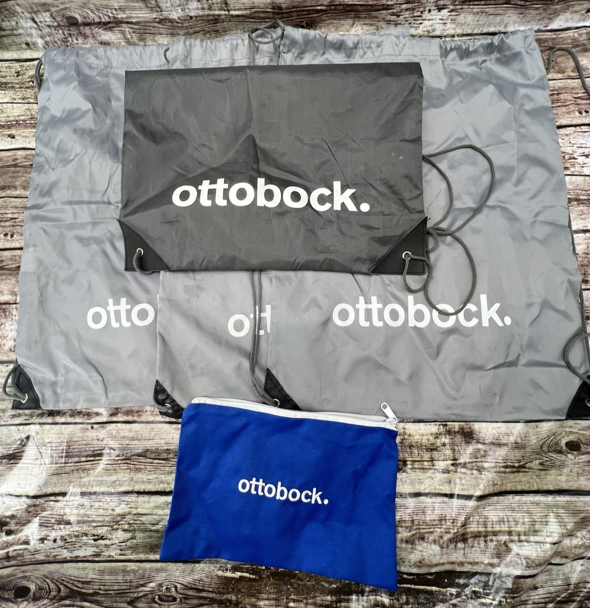 Set of 4 Ottobock Drawstring Bags Sling Pack Gray About 22” x 17” W/Blue Zip Bag