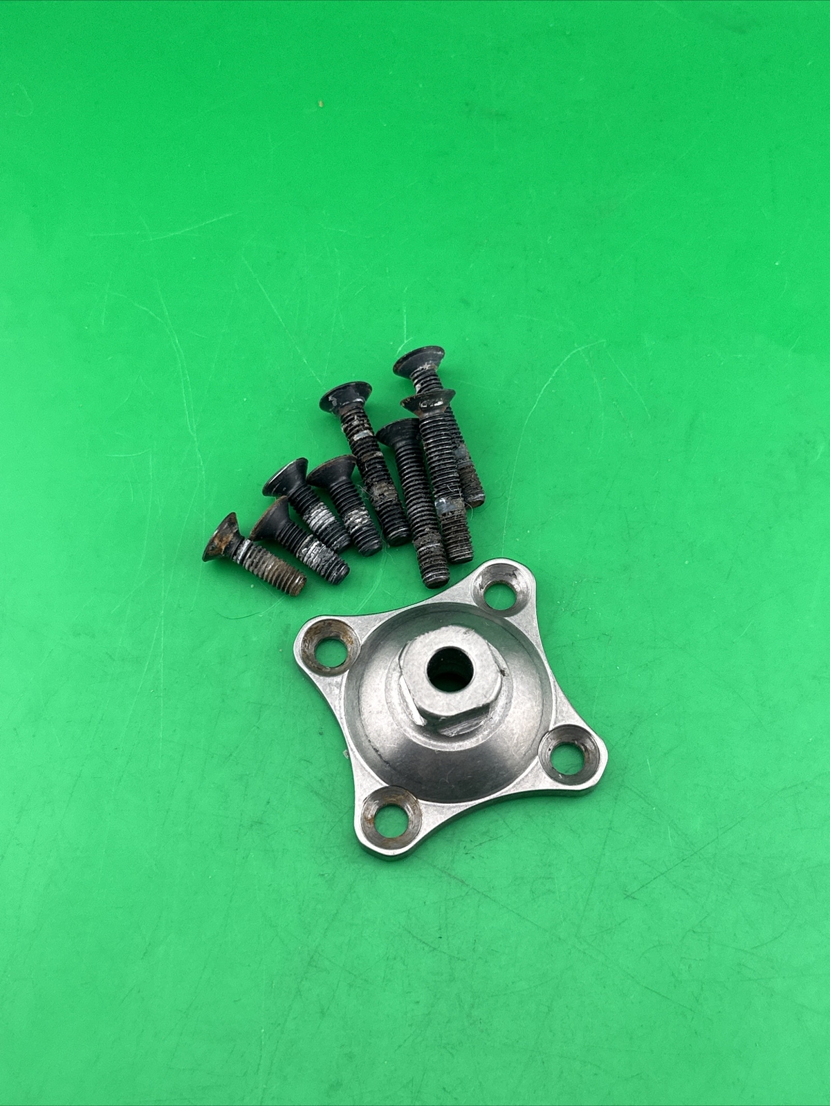 Prosthetic 4 Hole Plate Adapter Component. Titanium