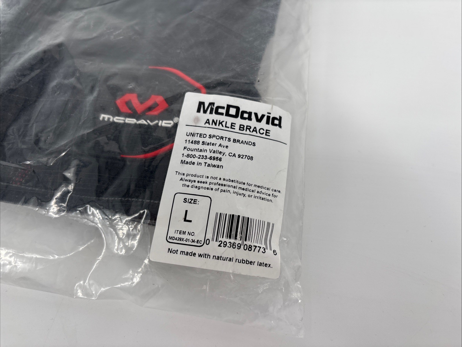 McDavid 429X Hinged Knee Brace with Crossing Straps – Black