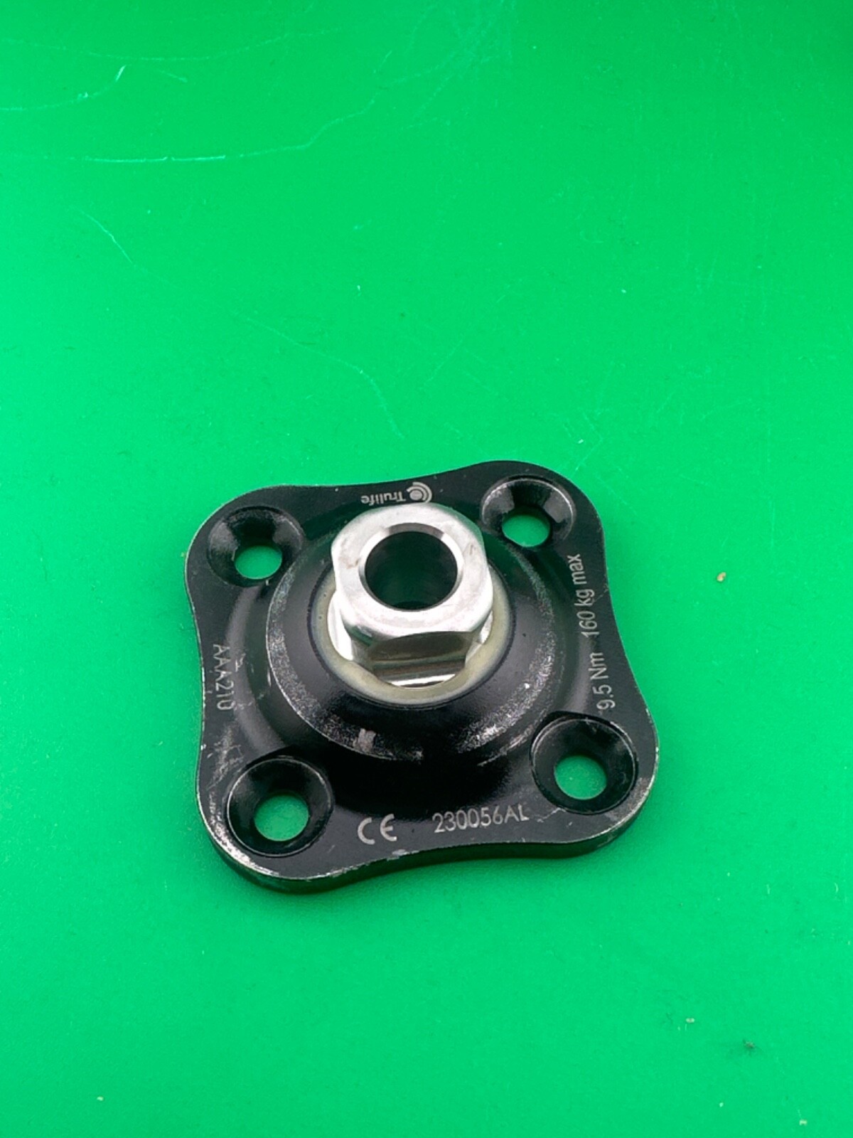 Prosthetic component adapter part. Trulife 4 four hole plate. AAA210