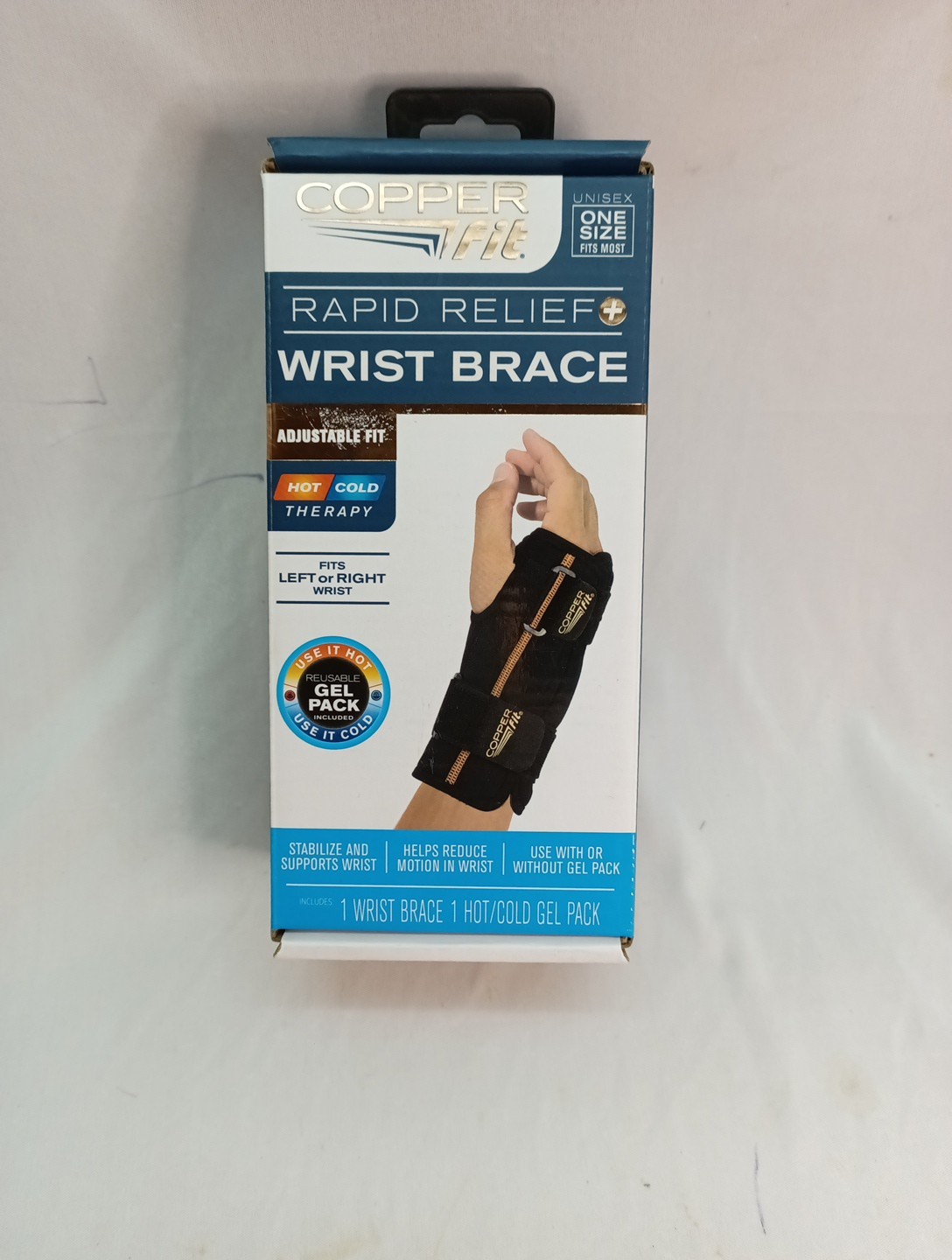 Copper Fit Rapid Relief Wrist Brace. Adjustable Hot/ Cold
