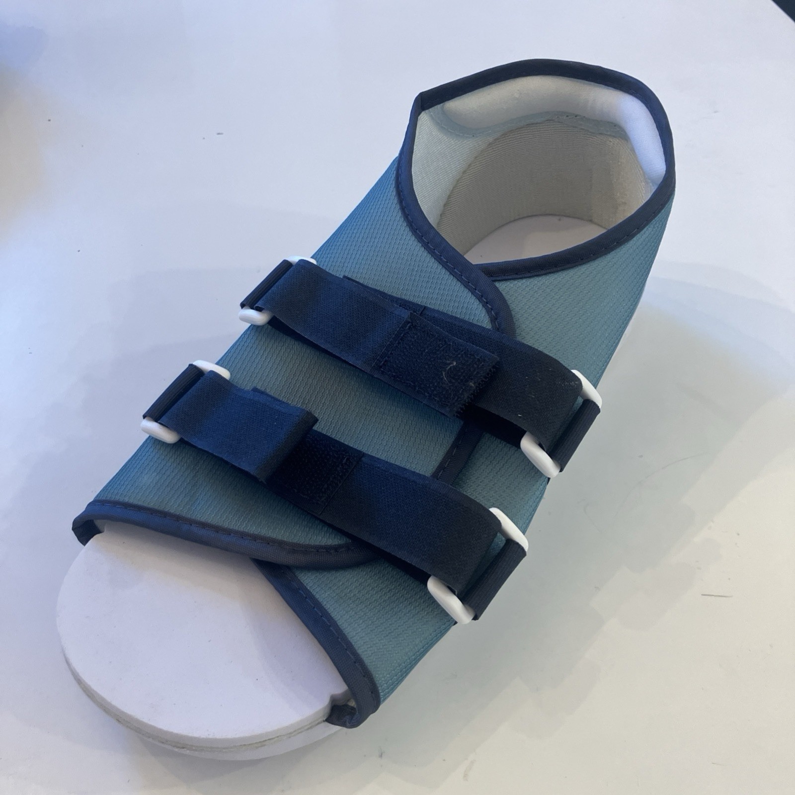 Walking boot and 2x post-op shoes