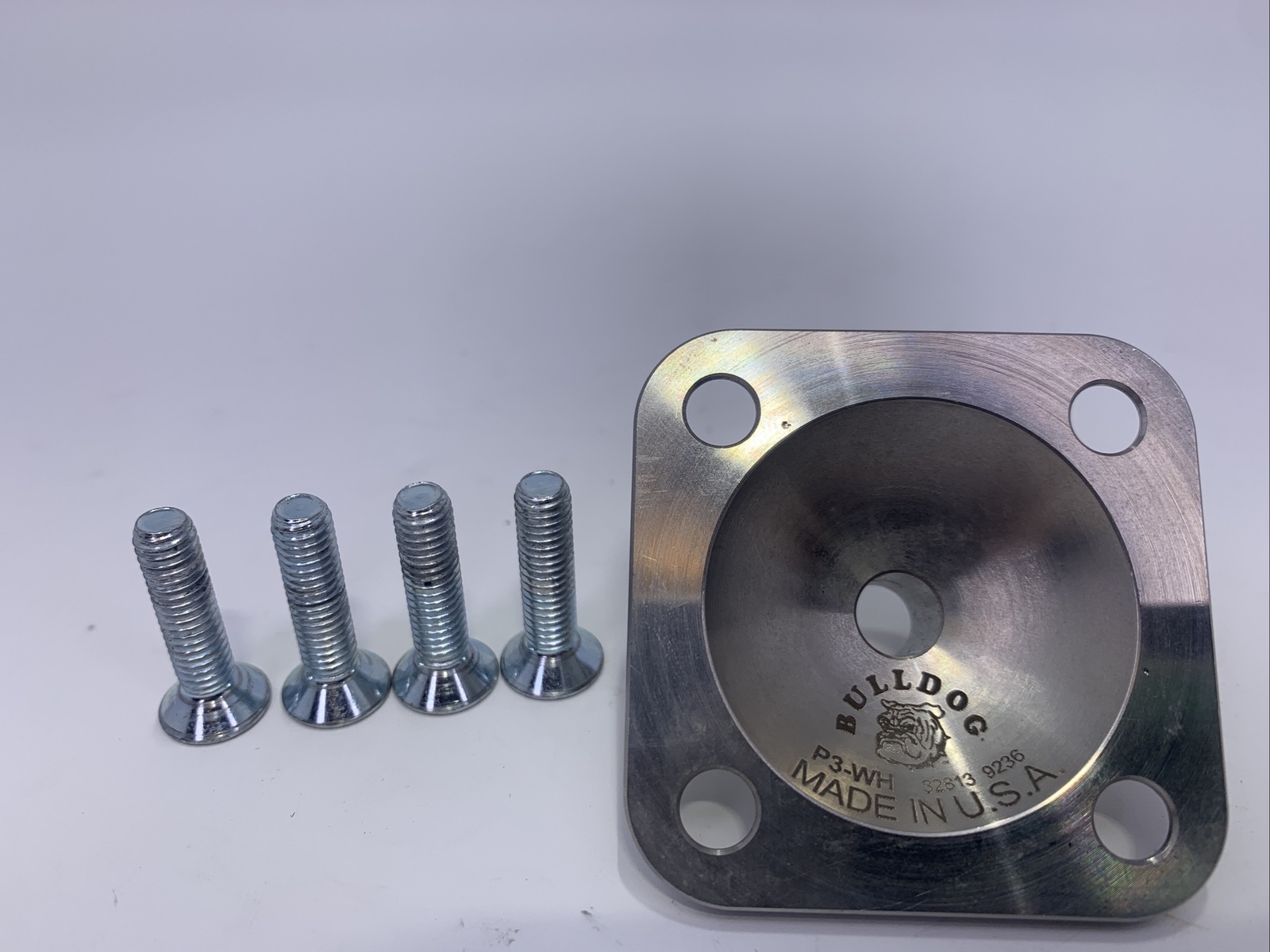 Bulldog prosthetic leg part, component, adapter, 4 hole male pyramid plate.