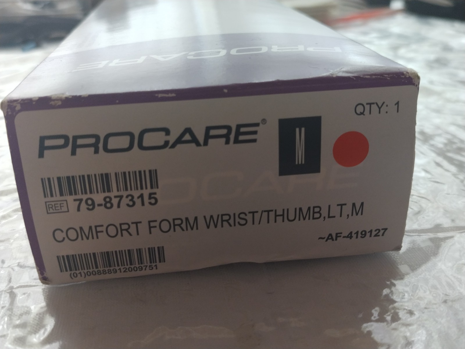 PROCARE ComfortFORM Wrist Splint Aluminum Stay Foam Lycra Left Hand Black Medium