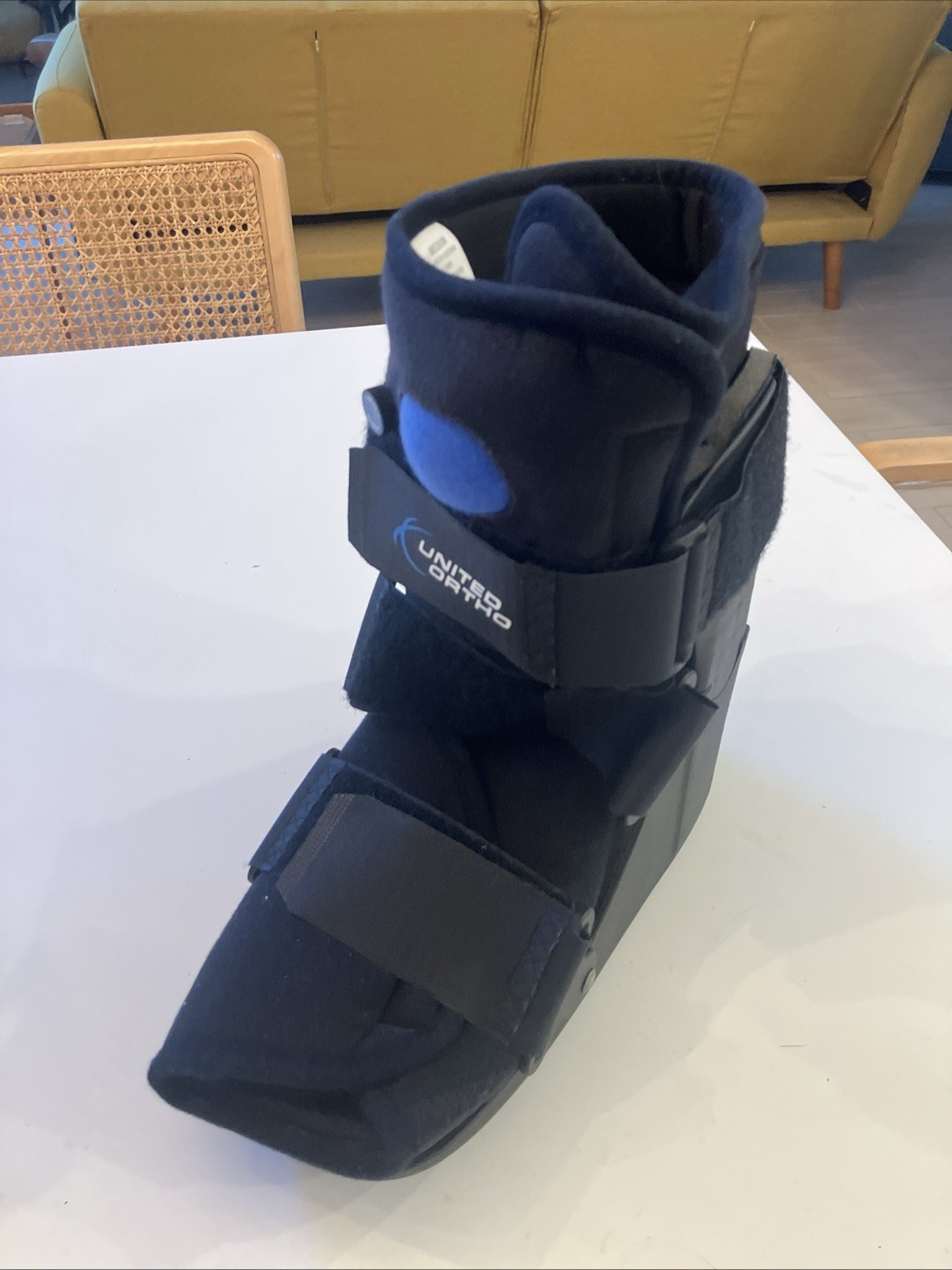 Walking boot and 2x post-op shoes