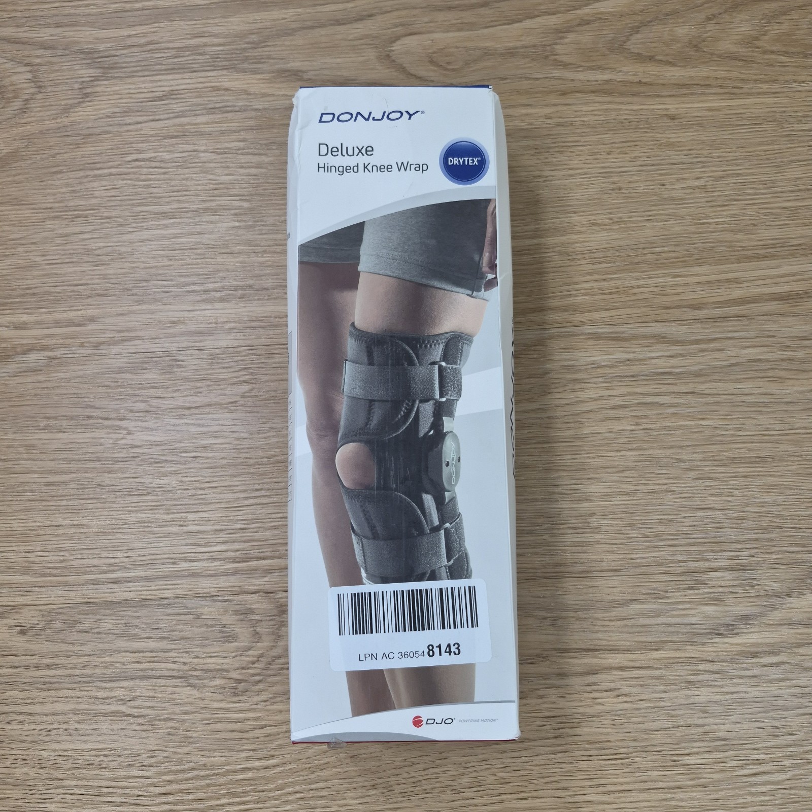 DonJoy Deluxe Hinged Knee Brace Drytex Sleeve Open Popliteal (Small) w/ Med Logo