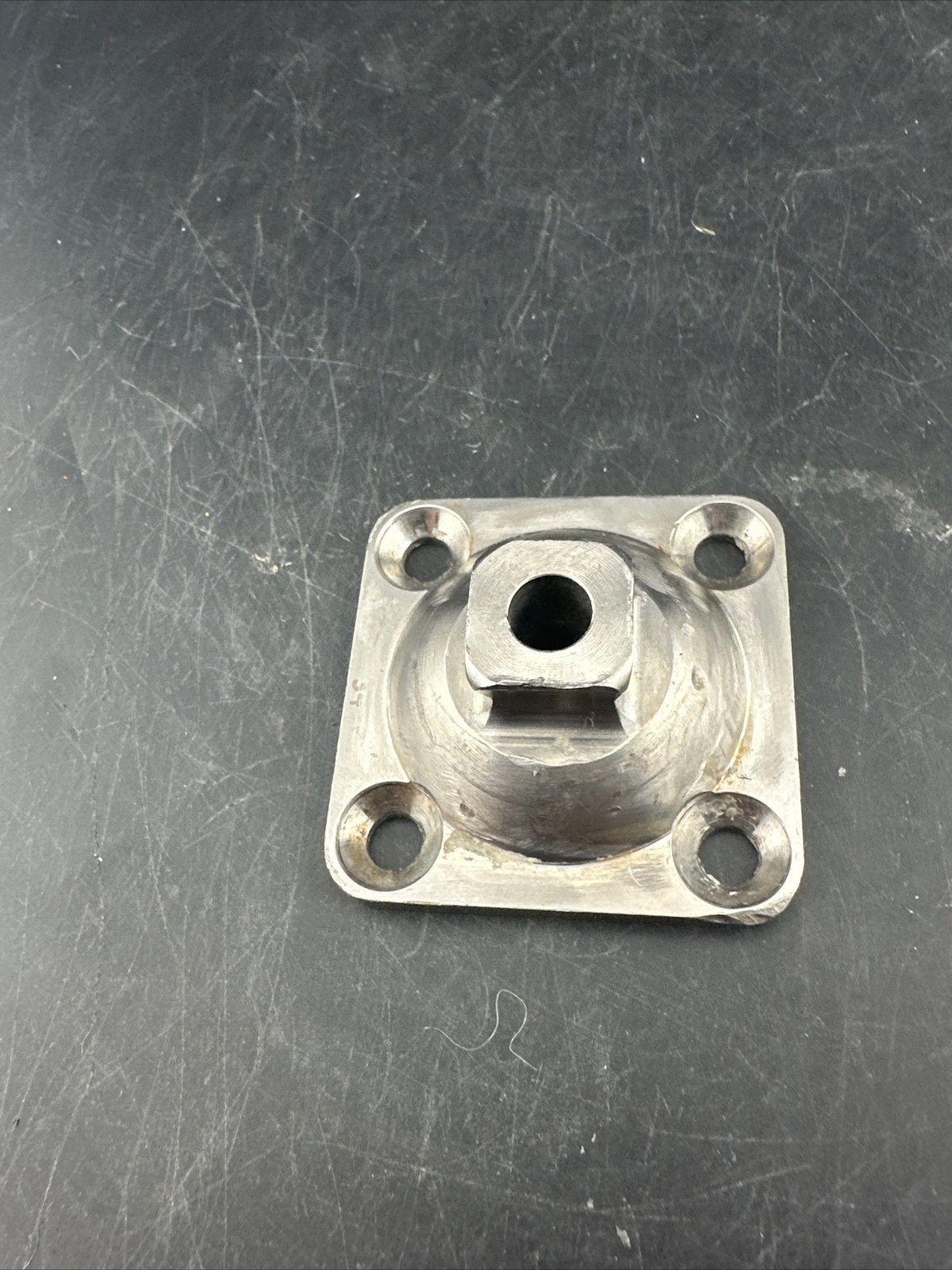 Prosthetic 4 Hole Plate Adapter Component.