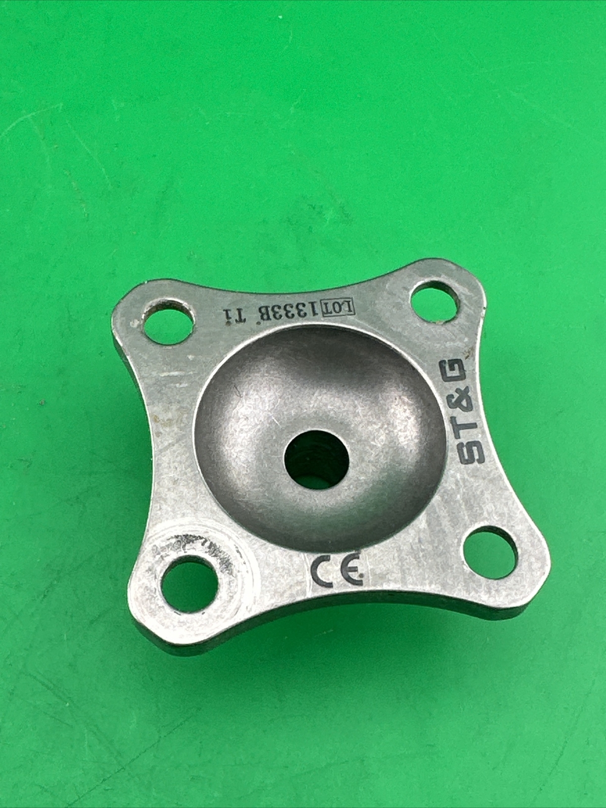 Prosthetic 4 Hole Plate Adapter Component. Titanium
