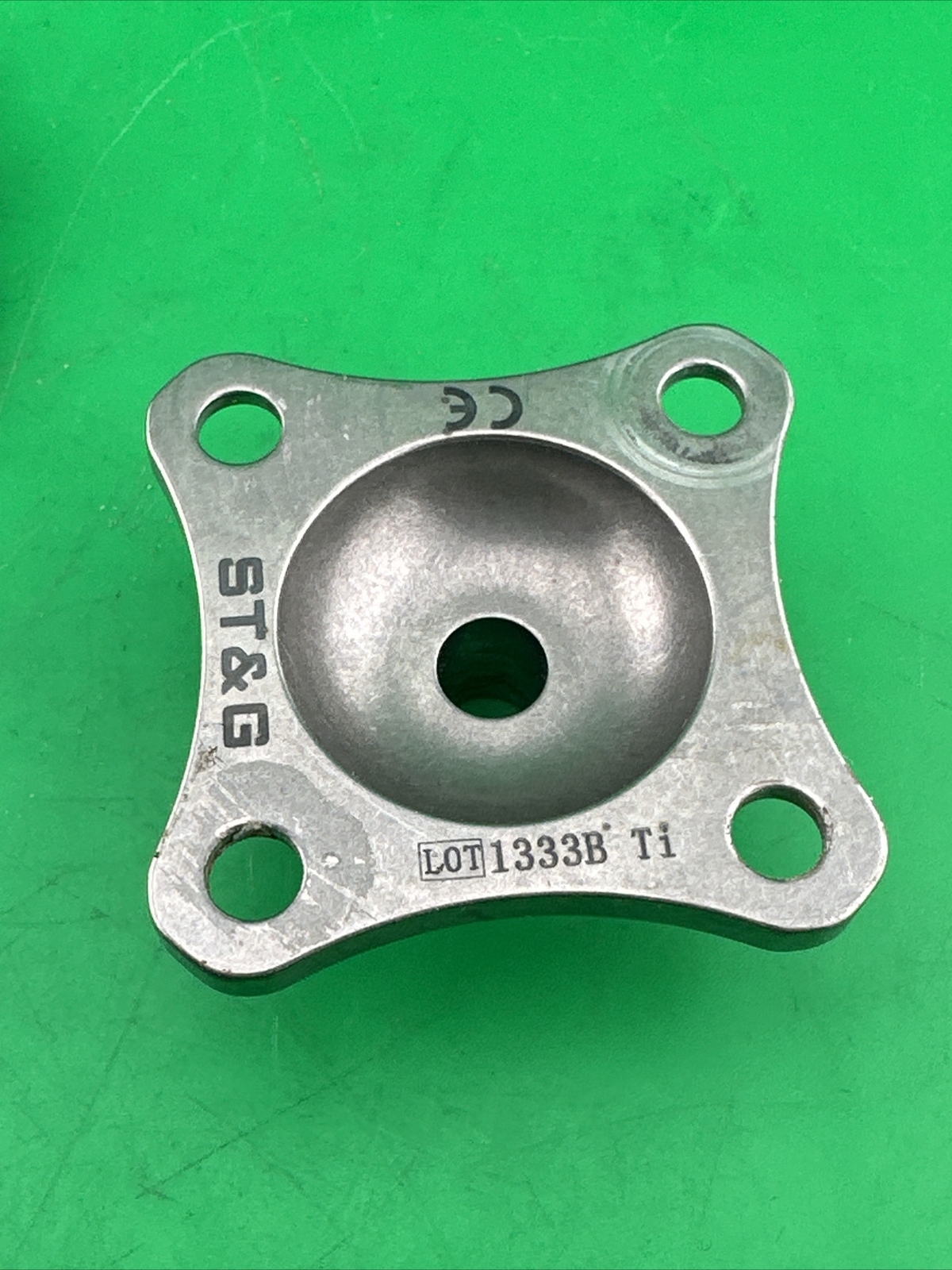 Prosthetic 4 Hole Plate Adapter Component. Titanium