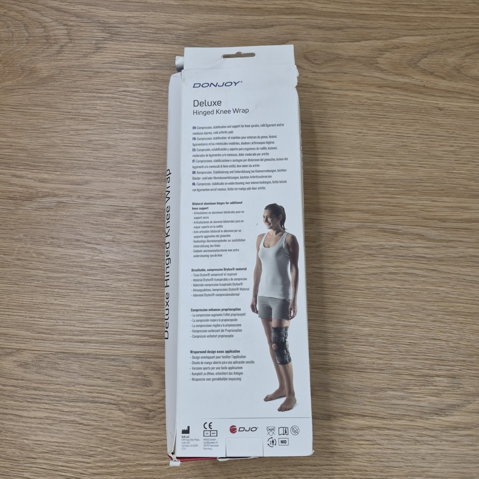 DonJoy Deluxe Hinged Knee Brace Drytex Sleeve Open Popliteal (Small) w/ Med Logo