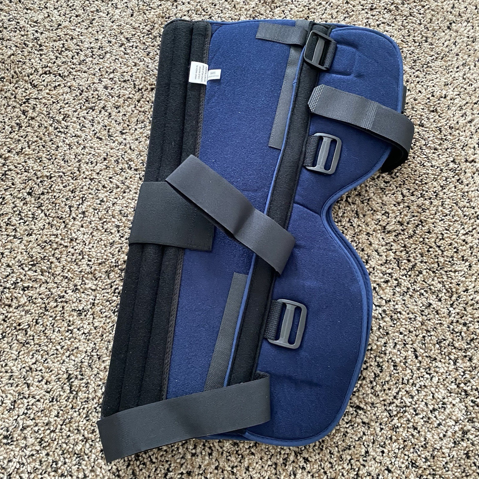 United Ortho 61020 3-Panel Adjustable Knee Immobilizer 20in Blue Black Brace