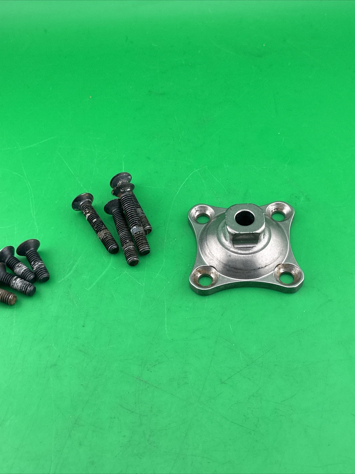 Prosthetic 4 Hole Plate Adapter Component. Titanium