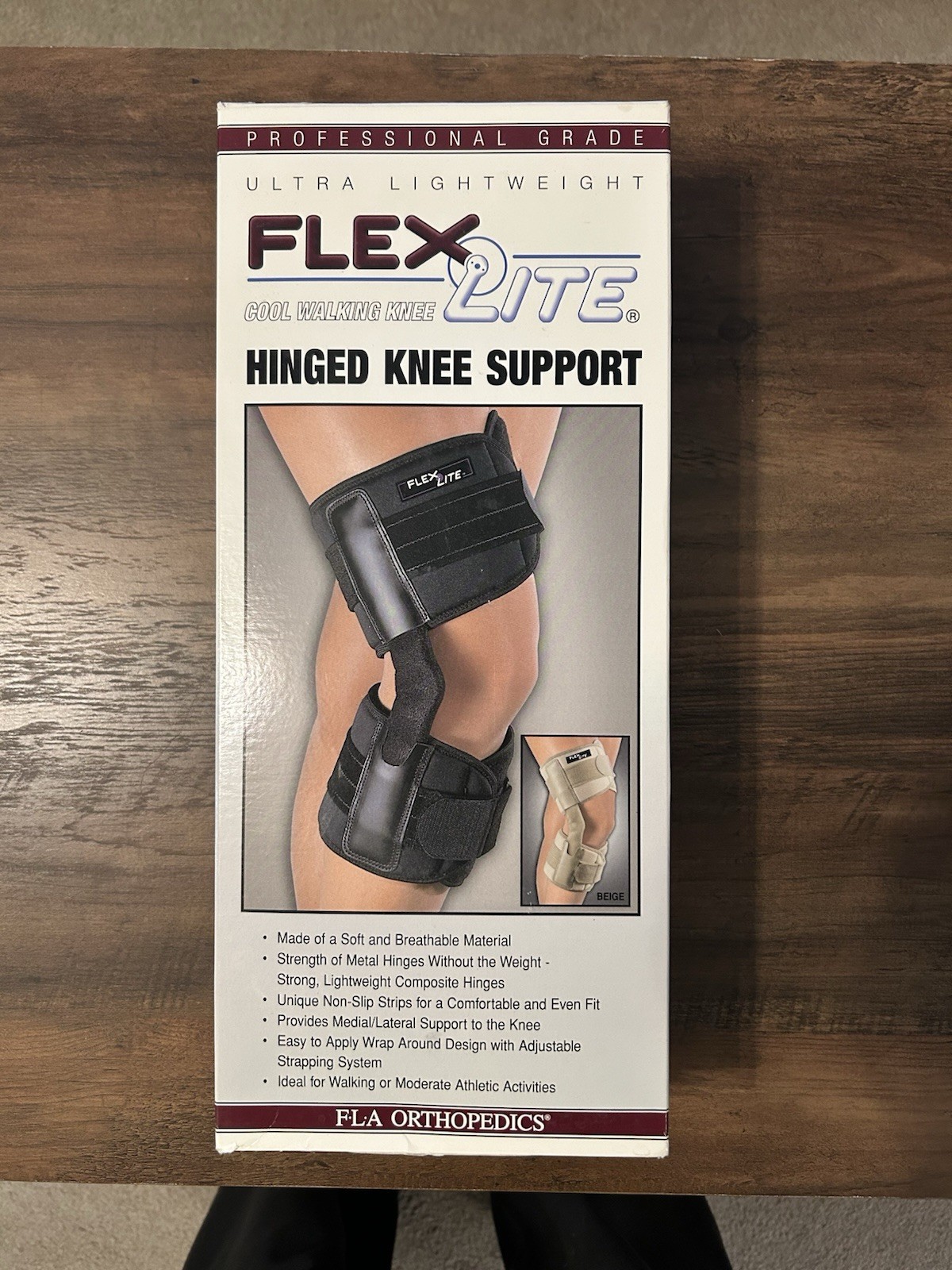 FLA orthopedics Flexlite hinged knee brace knee support Small Black