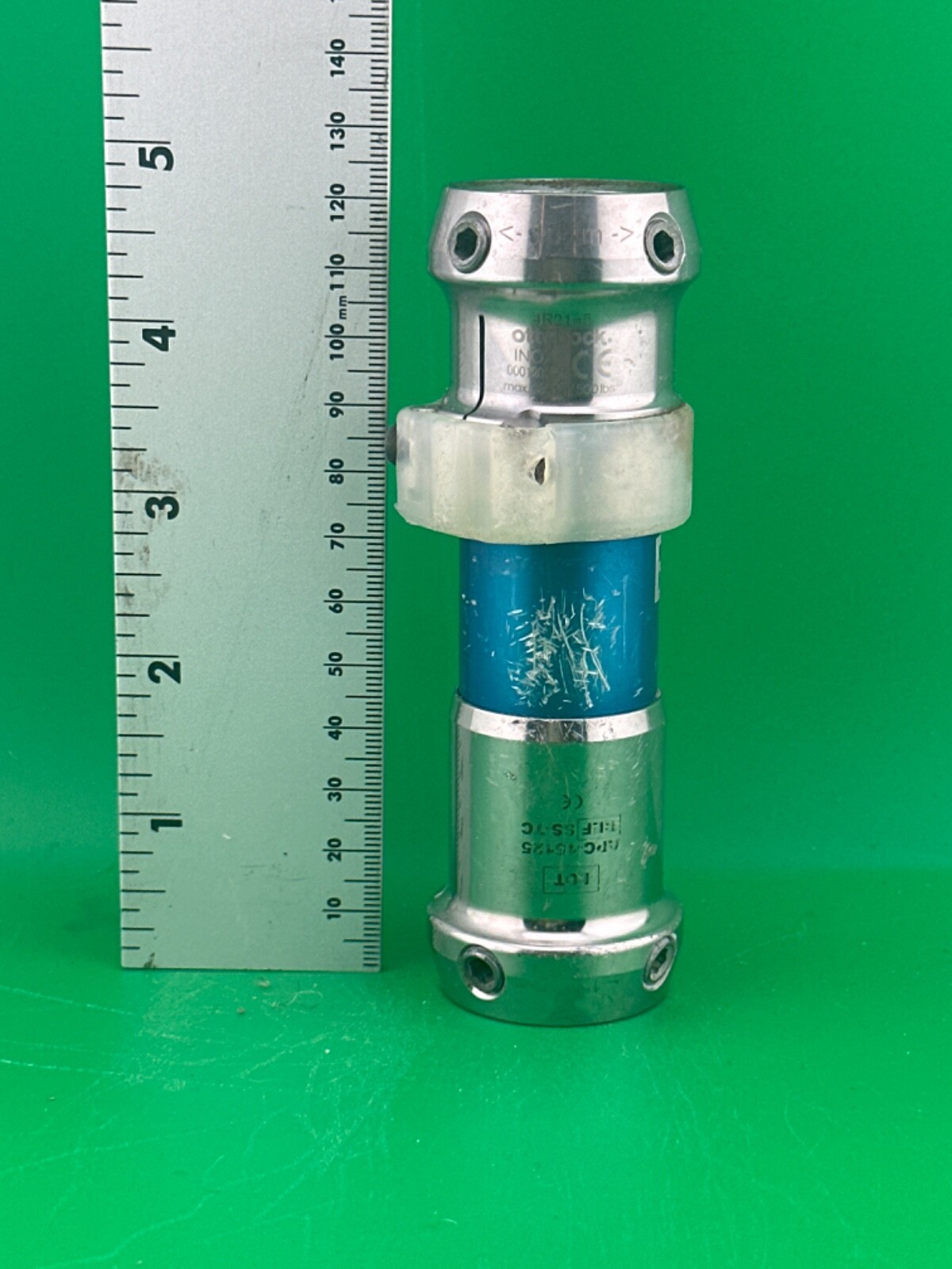 Prosthetic component adapter part. Pylon with tube clamp.