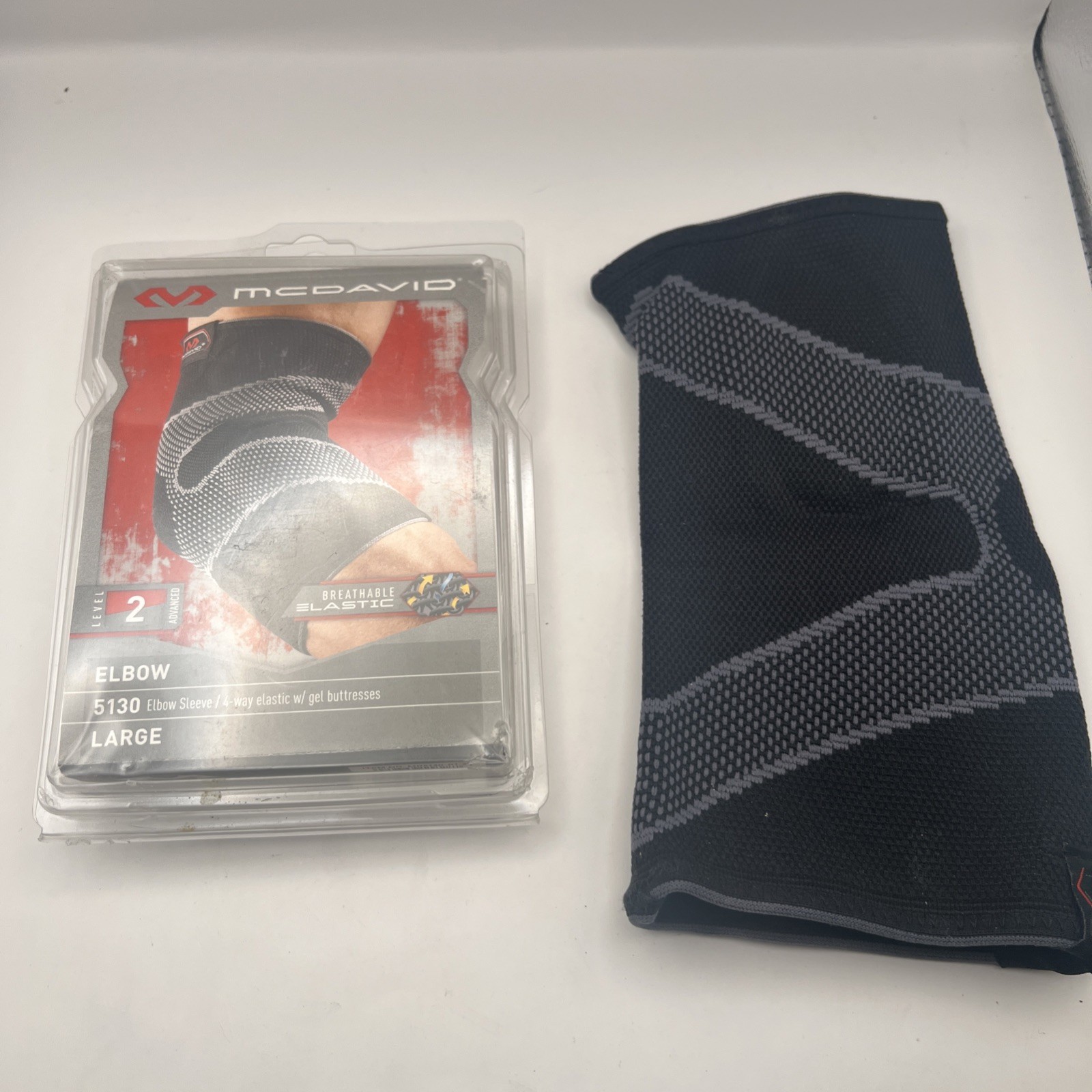McDavid 4-Way Elastic Elbow Sleeve with Gel Buttresses