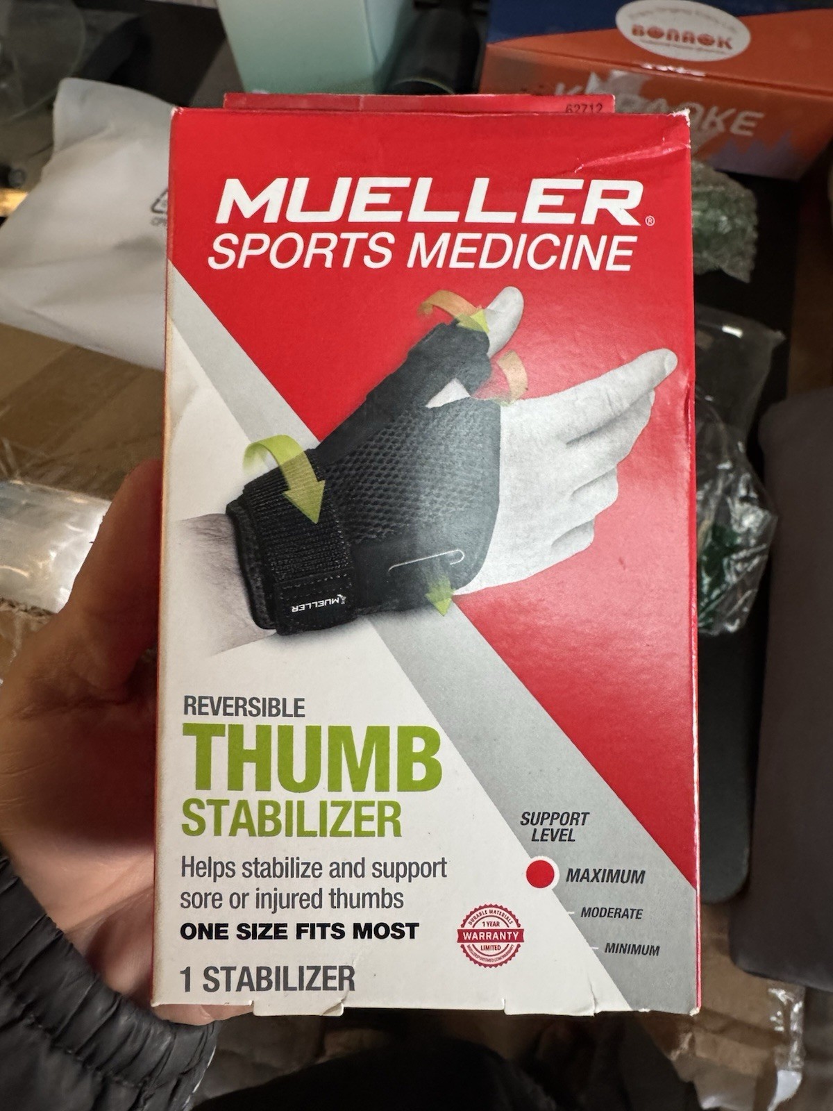 New Mueller Reversible Thumb Stabilizer – 62712 Black, One Size Fits Most