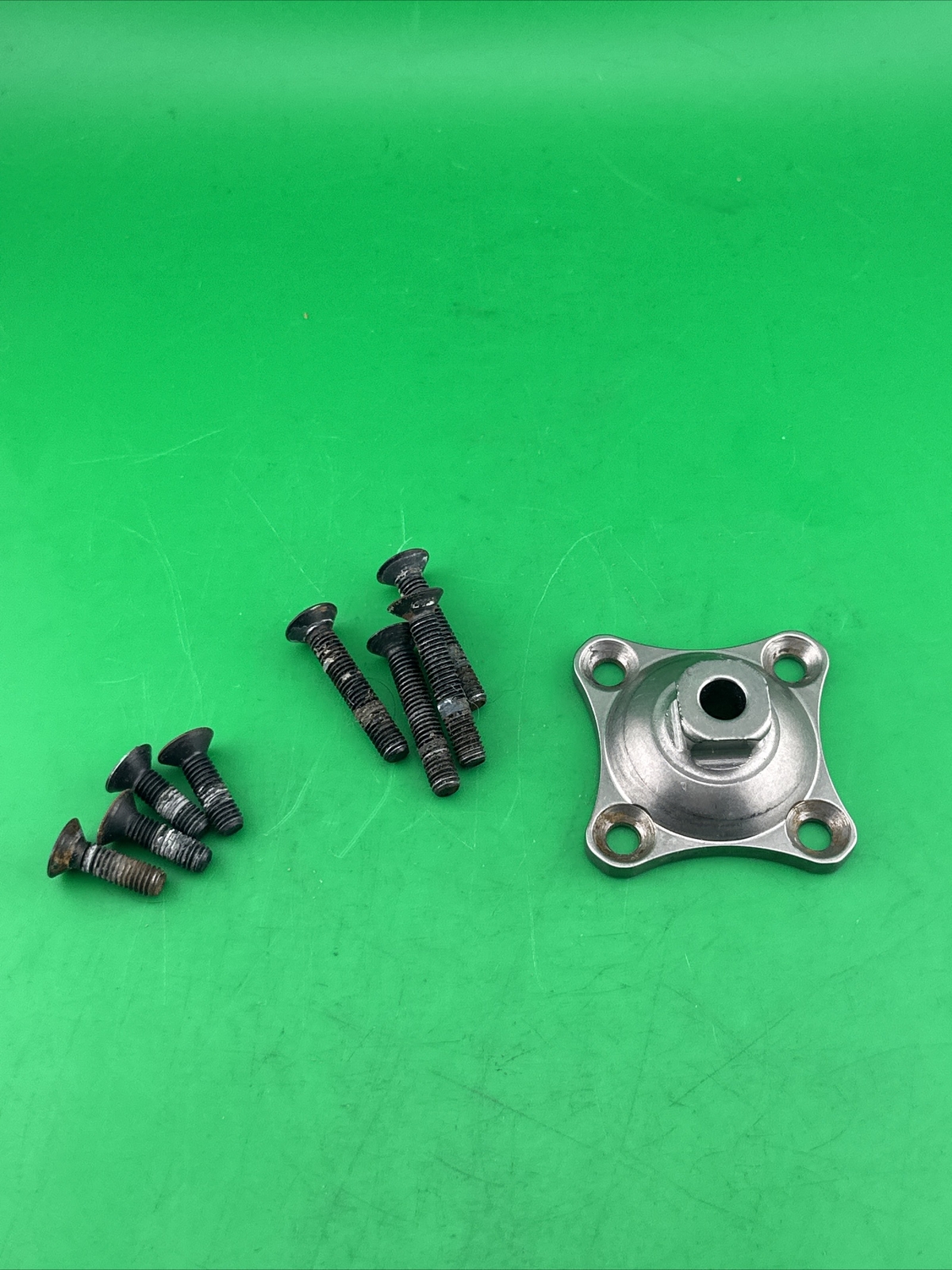 Prosthetic 4 Hole Plate Adapter Component. Titanium