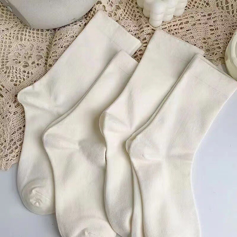 Girls pile up socks