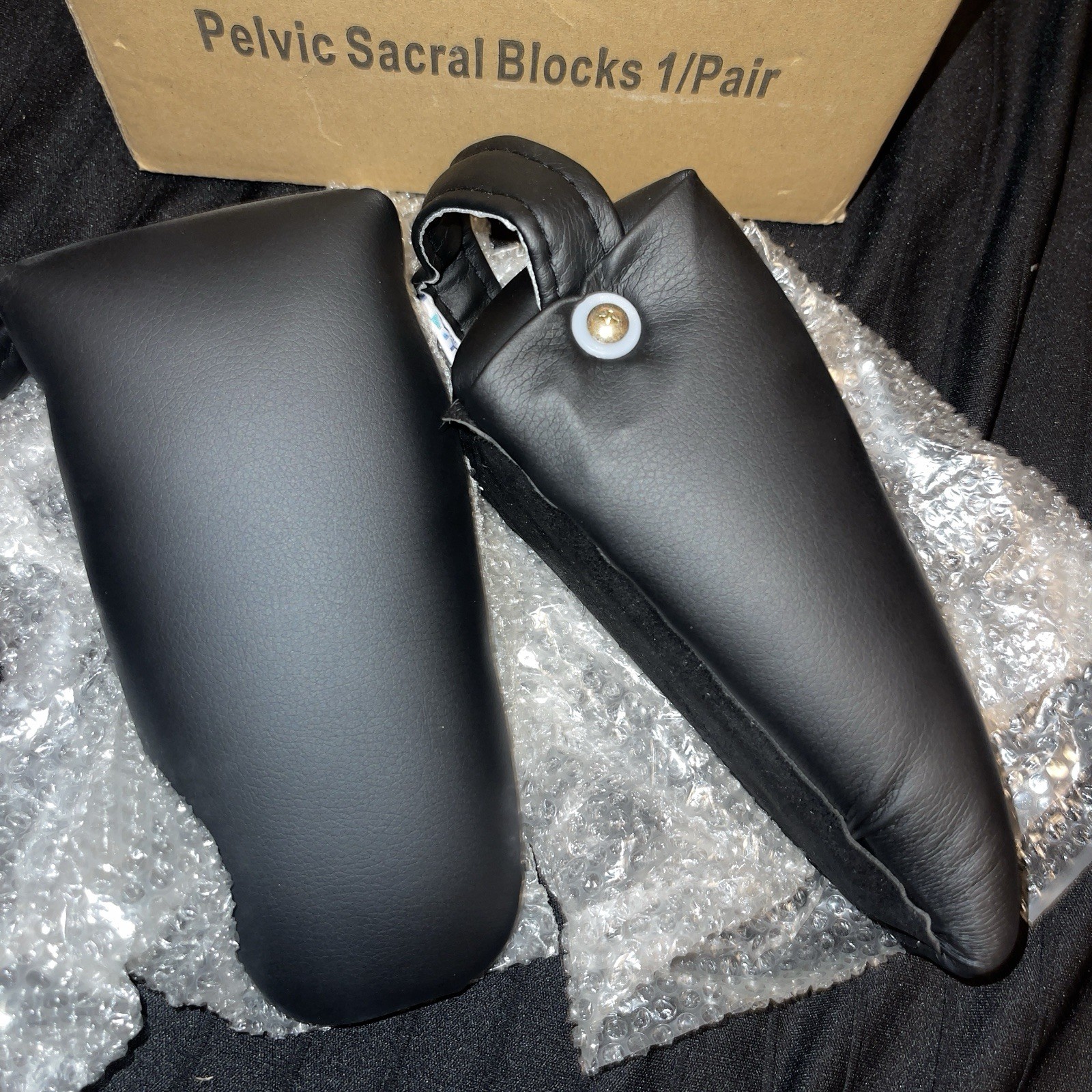 Pair Of pelvic sacral blocks