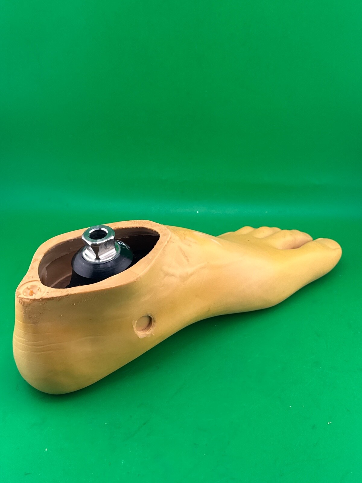 Uniprox single axis prosthetic foot. Left. Size 26