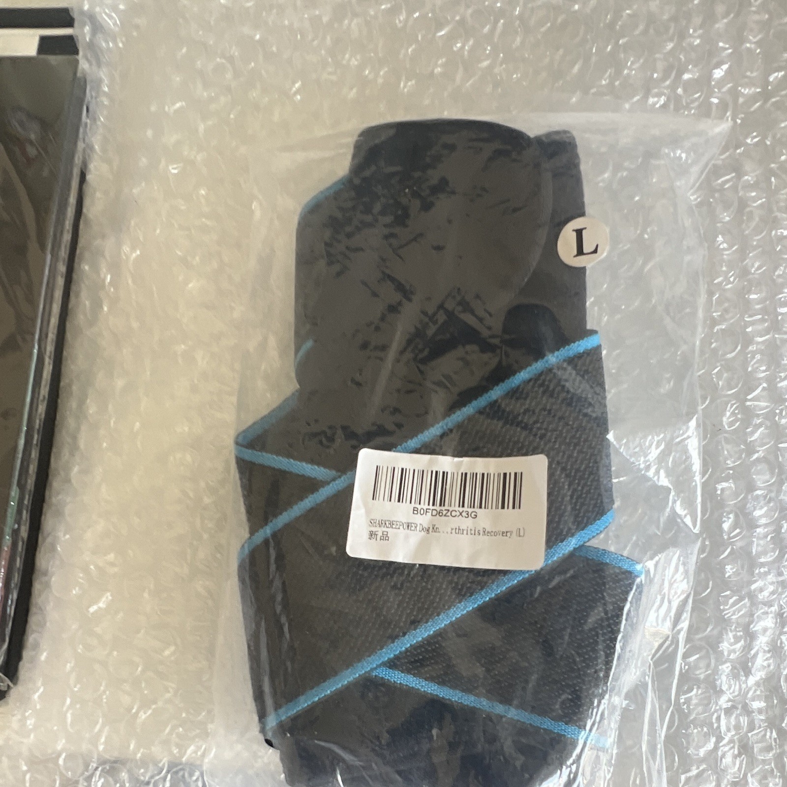 Size L Orthopedic Support Brace Sleeve, Black with Blue Trim