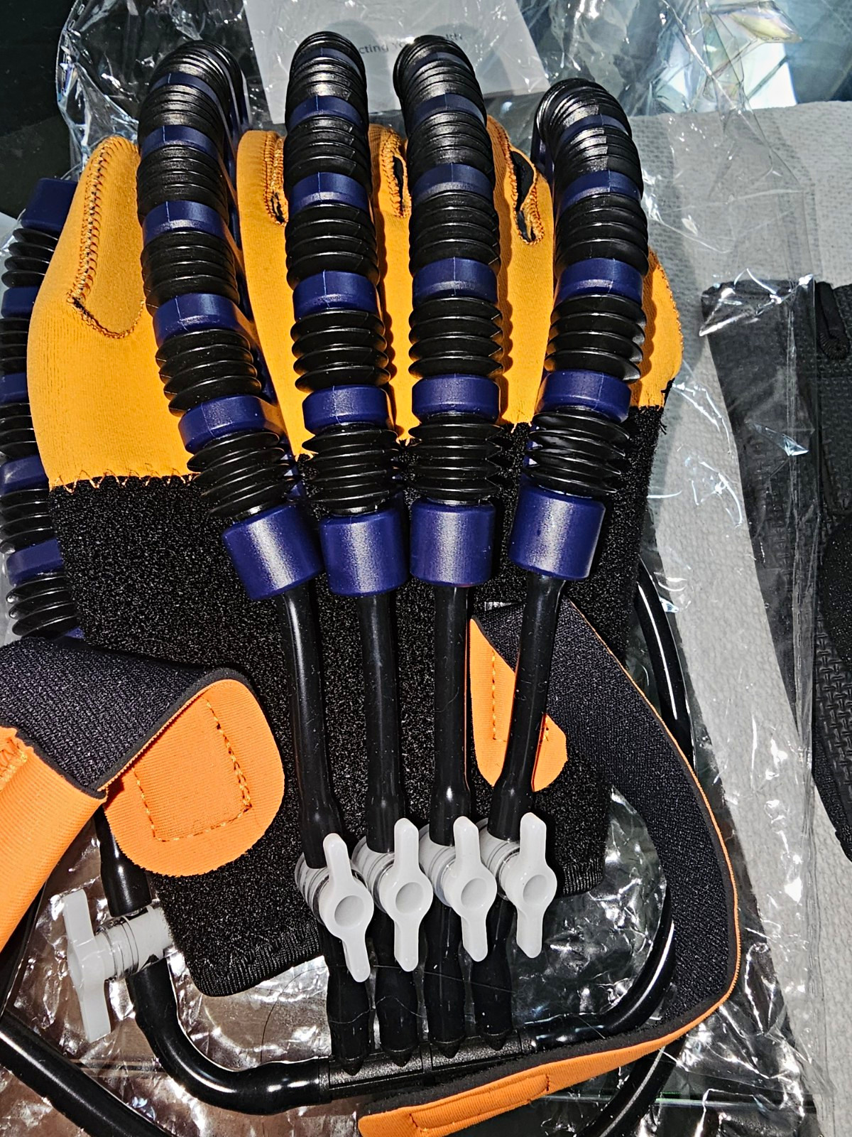 Adjustable Plastic Hand Brace for Rehabilitation, Orange/Black, One Size