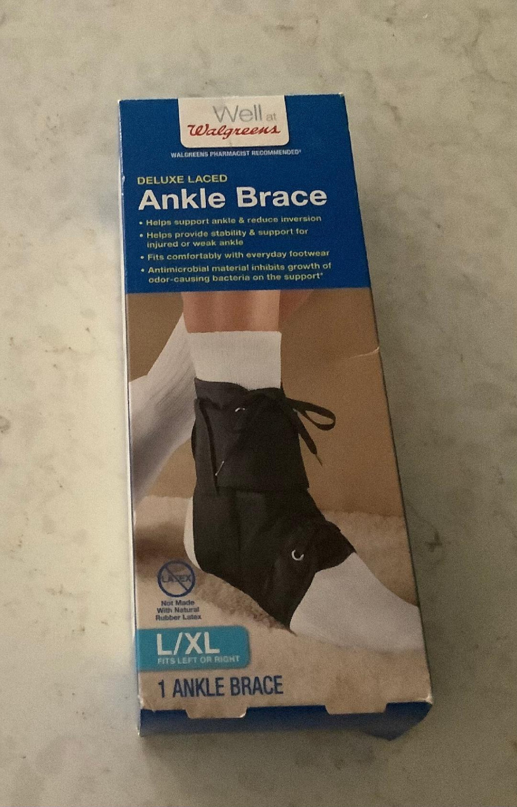 NEW WITH BOX, DELUXE LACED ANKLE BRACE FITS LEFT OR RIGHT SIZE L/XL BLACK