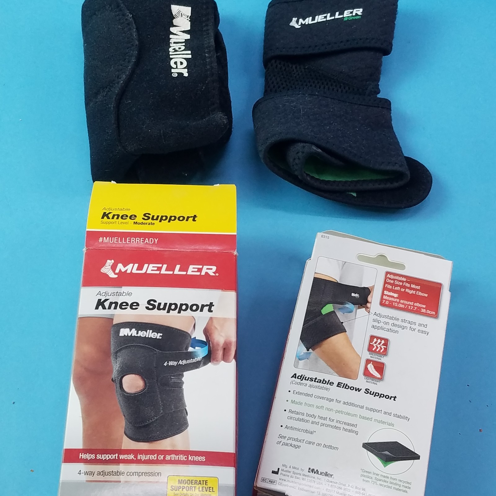 Mueller One elbow support and one knee support Both adjustable one price